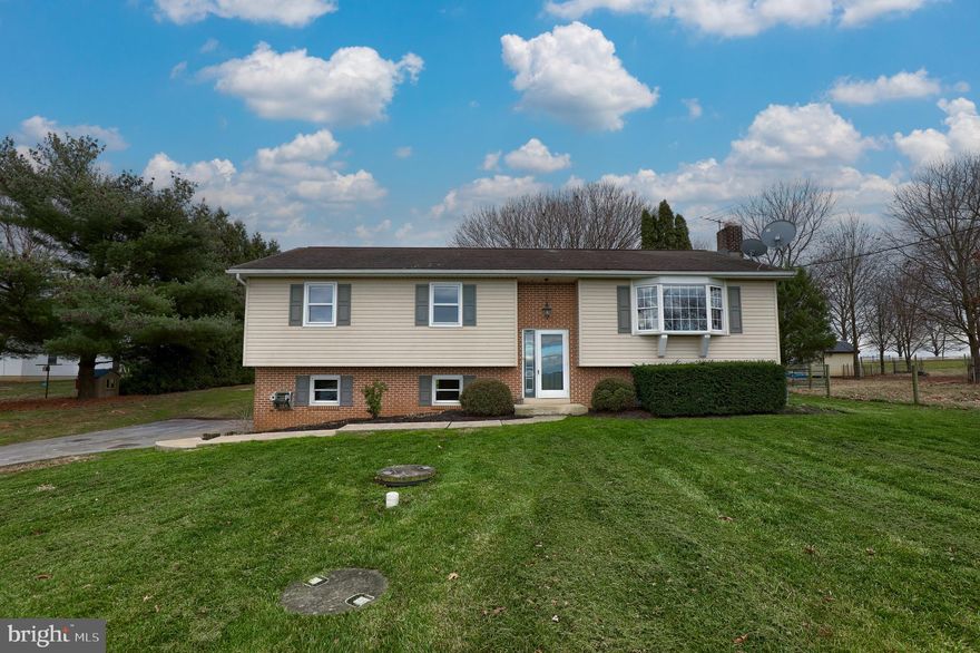 Welcome to this charming  bi-level home in Gap, PA! Featuring  3 bedrooms, 1.5 baths, and beautiful farmland views! The upper level includes the kitchen, bright dining room and family room, full bath and 3 spacious bedrooms. The lower-level features a half bath and a cozy family room featuring a fireplace. This space could also be utilized as an optional 4th bedroom! This home has been freshly updated with new paint and carpet throughout! Stay comfortable with central air and the sewer system was upgraded 8 years ago for added assurance. Located in close proximity to Salisbury Elementary School!  Don't miss the chance to experience the warmth and beauty of this home firsthand—schedule your showing today and discover your next chapter in this picturesque setting!"