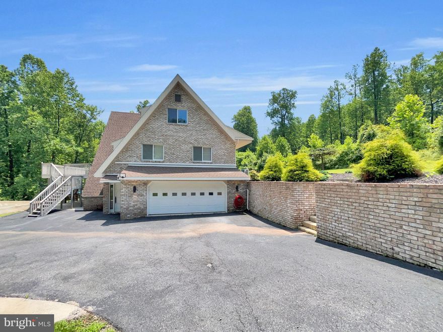 Gorgeous Custom 5 Bedroom and 4.5 Bathroom Contemporary Home set at the end of a long driveway on over 21 private and peaceful acres in Cumru Township.   Fully renovated from top to bottom in recent years, this exceptional home offers a rare blend of luxury,  versatility and privacy.  Featuring not only complete In-Law Quarters on the Lower Level but also 2 Bedroom Suites on the Main Level. The tone for this elegant home is set  upon arrival as you emerge from the wooded drive into a sunlit clearing and are greeted by the large home's impressive presence.  Once inside the Main Level features an open concept Kitchen and Living Room Area.  The Chef's Kitchen features quartz counter-tops and stainless steel appliances and the adjoining Living Room centers around a Fireplace and opens directly to a deck overlooking the serene surroundings. The 2 Bedroom Suites on this level each include a private Bathroom and an ample closet space.  Downstairs, is a full In-Law Quarters offers ideal multigenerational living with its own Kitchen, Living Area, Bedroom and Bathroom.  Upstairs, there are 2 Bedrooms and an additional Bathroom as well as a vaulted ceiling Family Room.  Additional highlights include 2 Laundry Rooms, attached oversized 2 Car Garage, Storage Shed and subdivision potential.  Schedule tour private showing today and come and experience all that this stunning property has to offer first hand!