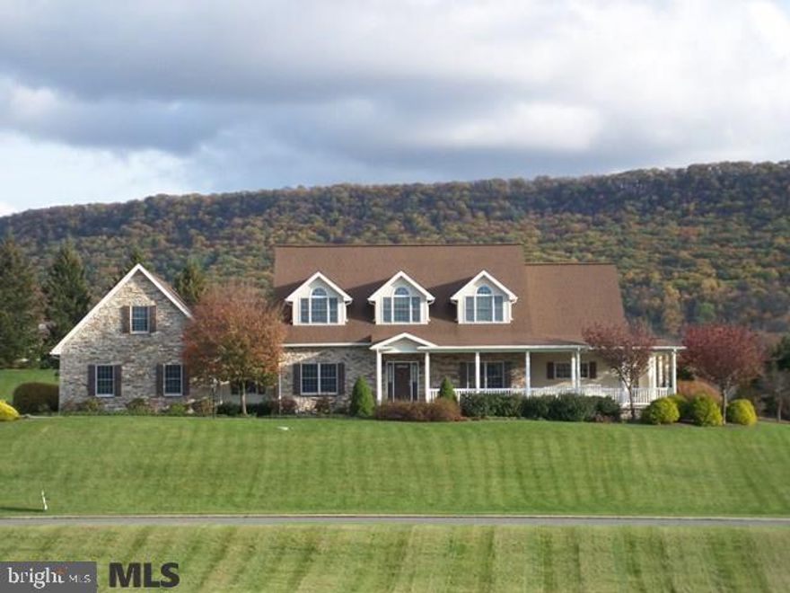 This Cape Cod style residence is located in the highly regarded neighborhood of Huntridge Manor, recognized by its sweeping mountain vistas and generous, well-appointed landscapes. Designed to showcase views and appealing natural light, this residence provides a gracious feel of hospitality while maple hardwood floors bring a warm sense of style. The eat-in kitchen is outfitted with granite countertops, tile backsplash, cherry cabinets, island/breakfast bar, office nook and amazing walk-in pantry. You'll value an unforgettable breakfast room with walls of windows and access to patio or covered porch; a lovely great room with beautiful architectural details, built-ins and fireplace; and, a convenient first-floor master retreat with sitting area and private enclosed porch. The upper level offers four additional bedrooms, two full baths and family room. Notable: 9' ceilings, pocket doors, efficient geothermal, storage over garage, and one-year home warranty.