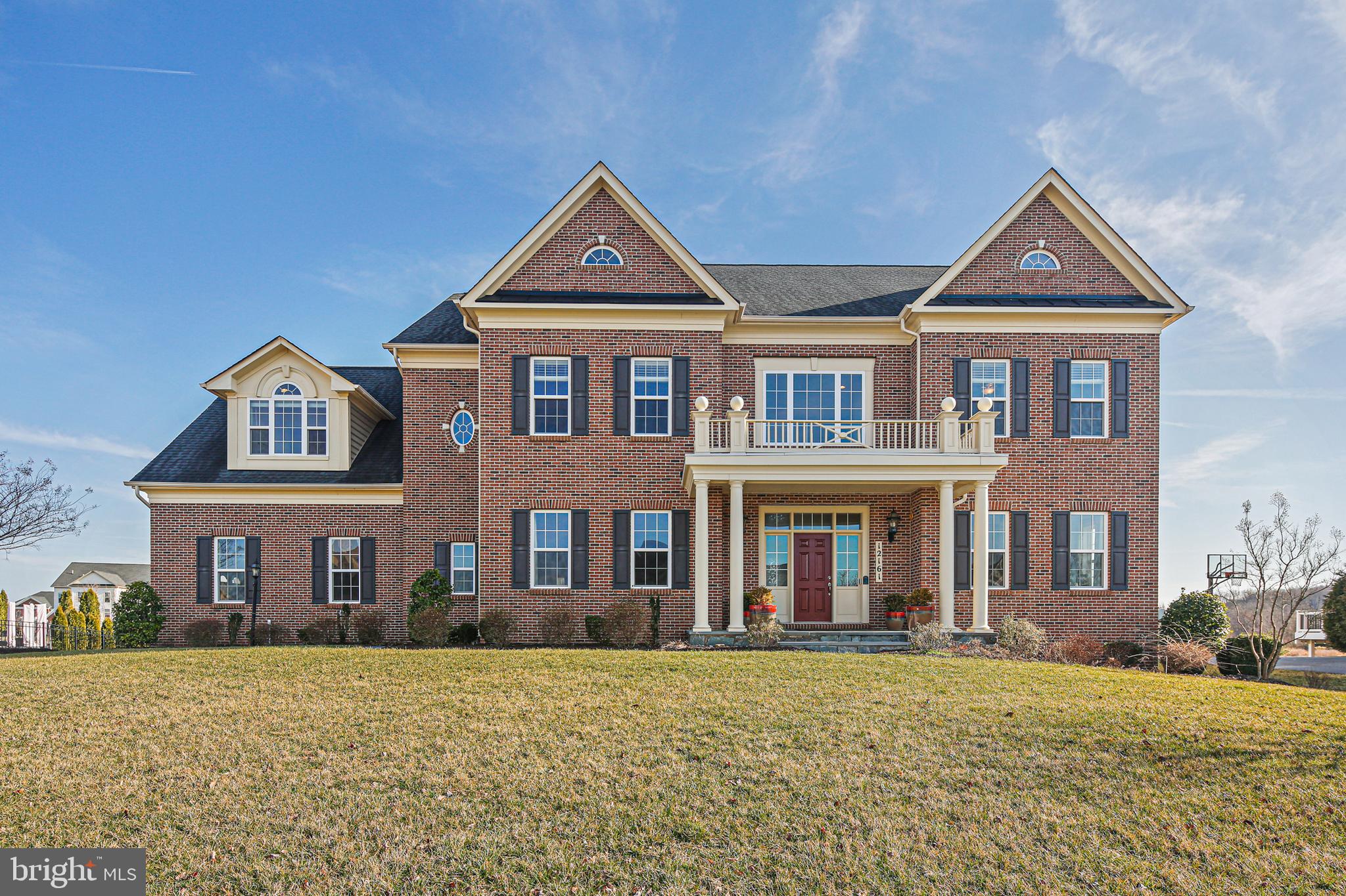 Looking for the perfect home? Look no further than this gorgeous property with all the features you have been searching for! As you enter, you will be immediately impressed by the grand 2-story foyer with a curved staircase that sets the tone for the rest of the home. The 2-story family room is perfect for entertaining with its cozy gas fireplace and ample natural light. A convenient back staircase is a great asset. The stylish kitchen boasts granite countertops and stainless steel appliances, while a mudroom offers practicality and convenience. Enjoy the great outdoors from your screened porch which overlooks beautifully landscaped grounds. The primary suite is a true oasis, complete with a sitting room and attached bath. The finished lower level provides extra space and includes a 5th bedroom and full bath. Potential energy efficiency is key with owned solar panels, and 3 HVAC systems. The property also boasts a 3-car garage, classic brick front, and ample driveway parking. Conveniently located near major routes and amenities. This home offers the perfect combination of luxury and convenience. Don't miss out on this amazing opportunity! Make this house your new home. Some photos are virtually staged. Please verify the schools with the county school board. HOA documents are online.