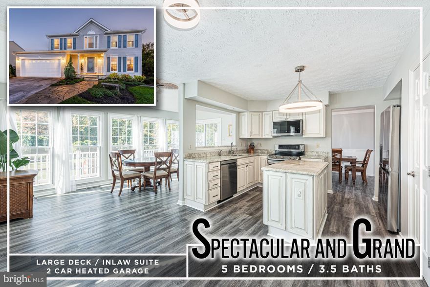 SPECTACULAR & GRAND UPDATED COLONIAL WITH A WIDE ARRAY OF AMENITIES! Over 3,500 sq. ft. of meticulously maintained living space featuring vinyl plank flooring throughout the main level, a formal living room and separate dining room with crown molding, a gourmet island kitchen with granite counters & ss appliances, a generously sized family room with tons of natural light, and a main level sunroom/breakfast area.  The upper level offers a total of 4 bedrooms & 2 full baths including an oversized Primary bedroom suite with a walk-in closet and a spa bath with double sinks, separate shower, and a large soaking tub.  The walk out finished basement would be perfect for an in-law suite and features a living space with a gas fireplace, a kitchenette area, a spacious bedroom and a full bath.  There is plenty of exterior living space with an expansive rear deck that overlooks the spacious rear yard.  Parking is not a problem with a 2 car heated garage with additional storage space and 2 car driveway.  Location can't be beat - convenient to tons of shopping & restaurants, and convenient to parks, schools, and major roadways.  This one truly has it all!