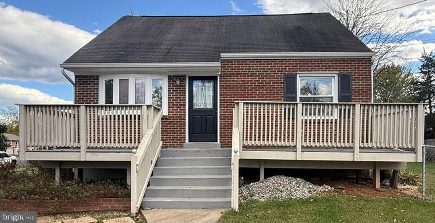 Great corner lot home/w plenty of parking. Hardwood throughout the main level, granite countertop in kitchen, tile kitchen floor, and basement set up as in-law suite with own entrance, three full bathrooms, kitchen net, and washer/dryer. Overside 2 car garage with additional parking. Very efficient. Great location!