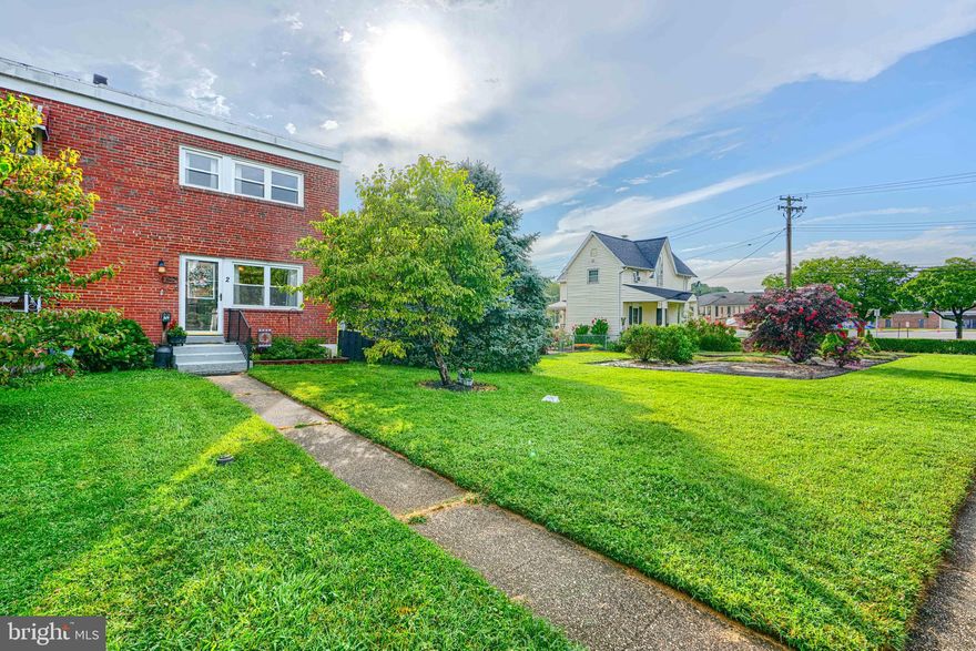 Welcome home to this charming end-of-group townhome offering 3 bedrooms, 1 full bath, and the rare bonus of private rear parking. Move-in ready, this home features fresh paint throughout, a cozy electric fireplace in the living room, and an updated kitchen with granite countertops, rich cherry cabinetry, and hardwood floors.

The partially finished lower level provides the perfect space for a family room, home office, or recreation area. Outside, you’ll be the envy of the neighborhood with a fully fenced end lot, expansive wood deck, pergola, and a versatile man cave/she-shed—complete with electric, cable hookup, A/C window unit, and extra insulation. An additional shed offers plenty of storage for tools and equipment.

Enjoy the convenience of private alley parking for two cars, plus a carport for covered parking for one more. This home blends comfort, style, and practicality in one inviting package.