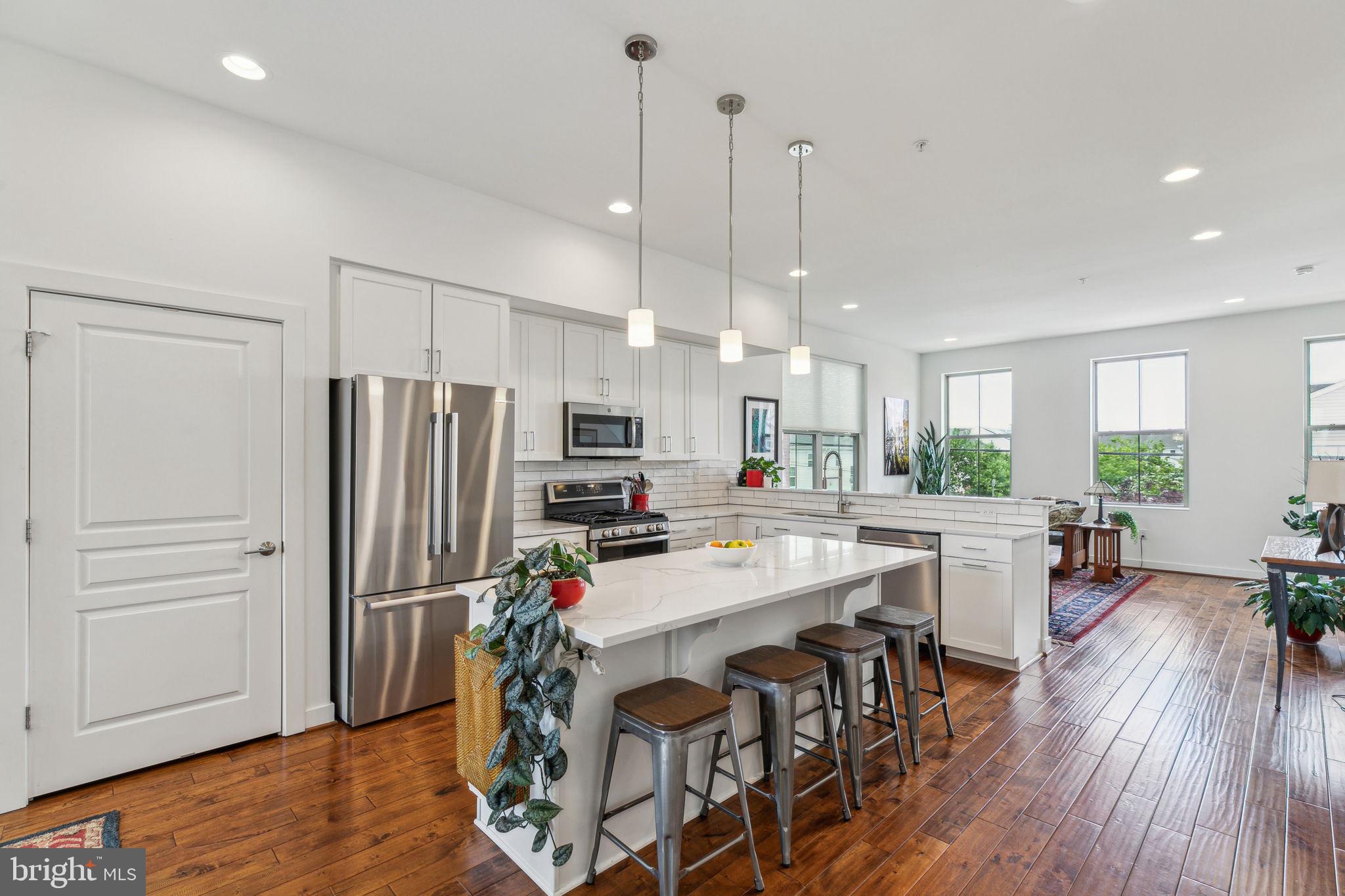 Welcome to 410 Reed Street — the most unique and breathtaking END UNIT in the highly sought-after Southwark on Reed community. This beautifully maintained Pennsport home offers 3 bedrooms, 3 full baths, and 2 half baths, with stunning GARDEN and CITY VIEWS, two oversized entertaining spaces, and a finished rooftop deck that’s sure to impress. If you're looking for a true showstopper, your search ends here.
This modern residence perfectly blends style, comfort, and convenience. Features include 10-foot ceilings, an open-concept main living area, gleaming hardwood floors throughout, and an abundance of natural light in every room. The first floor hosts a flexible bedroom/office space with a Murphy bed and ensuite bathroom. Upstairs, the second floor boasts a proper dining area, a spacious living room, and a sleek contemporary kitchen with stainless steel appliances, granite countertops, and a large island. The third floor features two generously sized bedrooms, each with walk-in closets and ensuite baths, along with a laundry room offering extra storage space. The fourth floor showcases the home's second expansive entertaining area, with windows on three sides capturing incredible city and garden views, a full wet bar with wine fridge, a half bath, and access to the finished rooftop deck — perfect for hosting. The finished lower level is ideal for a home office, gym, or media room. Additional highlights include a 2-car garage, 3 years remaining on the tax abatement, and access to a beautifully landscaped community courtyard.
Located in the heart of vibrant Pennsport, 410 Reed Street is steps away from neighborhood favorites like Rebel and Wolf, Herman’s Café, Cake and Joe, Dickinson Square Park, and the shops and restaurants along Passyunk Avenue. With easy access to I-95, Columbus Boulevard, and Center City, this home offers the perfect blend of suburban comfort and urban convenience. Don't miss this incredible opportunity—schedule your tour today!