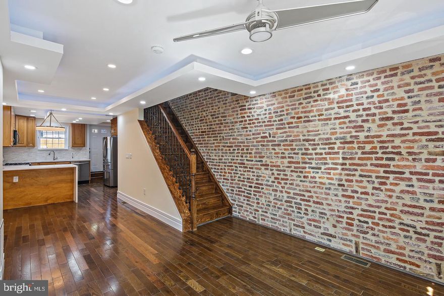 Charming 2-bedroom townhouse with two fully finished levels, offering abundant natural light throughout.
Enjoy the open floor plan with gleaming hardwood floors, a stunning bathroom, and modern updates throughout—including stainless steel appliances and granite countertops. Convenient upper-level laundry with washer and dryer.