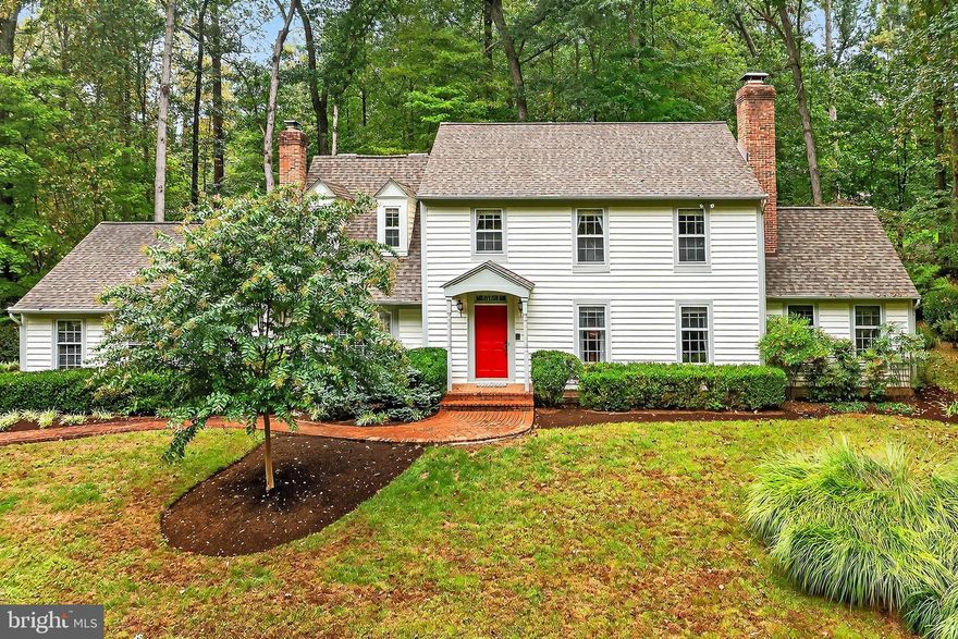 BUYERW WILL LOVE THIS TRULY PRIVATE RETREAT ON A PRIVATE DRIVE IN THE WOODS- Nestled in the highly sought after Fairfax Station community, this timeless New England colonial-style “Cambridge” model home sits on the “Private Drive” section of Clara Barton Drive! Sitting on over 1.4 tree-filled acres, this lot is one of the largest in the neighborhood and its location offers both privacy and convenience- making it the perfect tranquil retreat, all the while being minutes away from community amenities and commuter routes! Driving up the private drive, this 4 bedroom 2 full bath and 2 half bathroom home offers plenty of driveway parking, in addition to a side-loading two-car garage. A brick walkway, surrounded by professional landscaping and mature plantings, leads you to the home’s portico entry. Upon entering, space is in abundance. An entry foyer leads past a powder room to the beautifully remodeled kitchen, with stainless steel appliances and quartz counter tops, offering a kitchen island and separate eat-in kitchen. Off the kitchen area is the home’s spacious great room, offering a gas fireplace and access to the home’s main level laundry room, and screened-in porch. The formal side of the home can be found just inside, to the right, with a living room and dining room, adjacent to the kitchen. Buyers will appreciate the bonus room (home office or library) which is connected to the living room by a double-sided wood-burning fireplace and can be accessed, via the room’s French doors, from the backyard. Upstairs the primary bedroom feels like an oasis due to its vaulted ceilings, walk-in closet and en-suite bathroom with shower. Three additional bedrooms and a hallway full bathroom offer ample space for family members or guests and complete the upper level. Venture downstairs, to the basement, to find even more living and entertaining space, including a renovated half bathroom. Storage galore is available as well, in the large utility room, which could be transformed into an additional living space- ideas include: workout room, home office or home movie theater- the options are limitless! Making your way from the rear, screened-in porch, buyers will absolutely LOVE this home’s PRIVATE backyard retreat which extends back almost another 300 feet! (You read that correctly). Dog lover? Take advantage of the invisible dog fence. School pyramid is Robinson Secondary and Oak View Elementary schools. Community pool, tennis courts, neighborhood pond and walking trails are just some of the amenities that make Fairfax Station a sought-out community. Additionally, you will be close to Country Club of Fairfax, George Mason University, the historic City of Fairfax, Fairfax Station Swim and Tennis Club (memberships available), major shopping centers and more! For the fitness enthusiasts, enjoy Burke Lake Park, over 880 acres, and its various trails around Burk Lake. Commuters- this home’s location makes getting to/from work, or the airport, a breeze! Whether using Fairfax County Parkway, Route 123, I-66, I-95, I-495, Express Metro Bus (Route 18P) to the Pentagon, or hopping on the Burke Center Virginia Railway Express (VRE)- you have many choices at your disposal. Owners also have two airports to choose from: Dulles International or Reagan National. Live, work or play- this is an ideal “Town and Country” location that offers a fantastic community, tucked away in peaceful & secluded location, while being highly accessible for your commuting and personal needs. Welcome home!