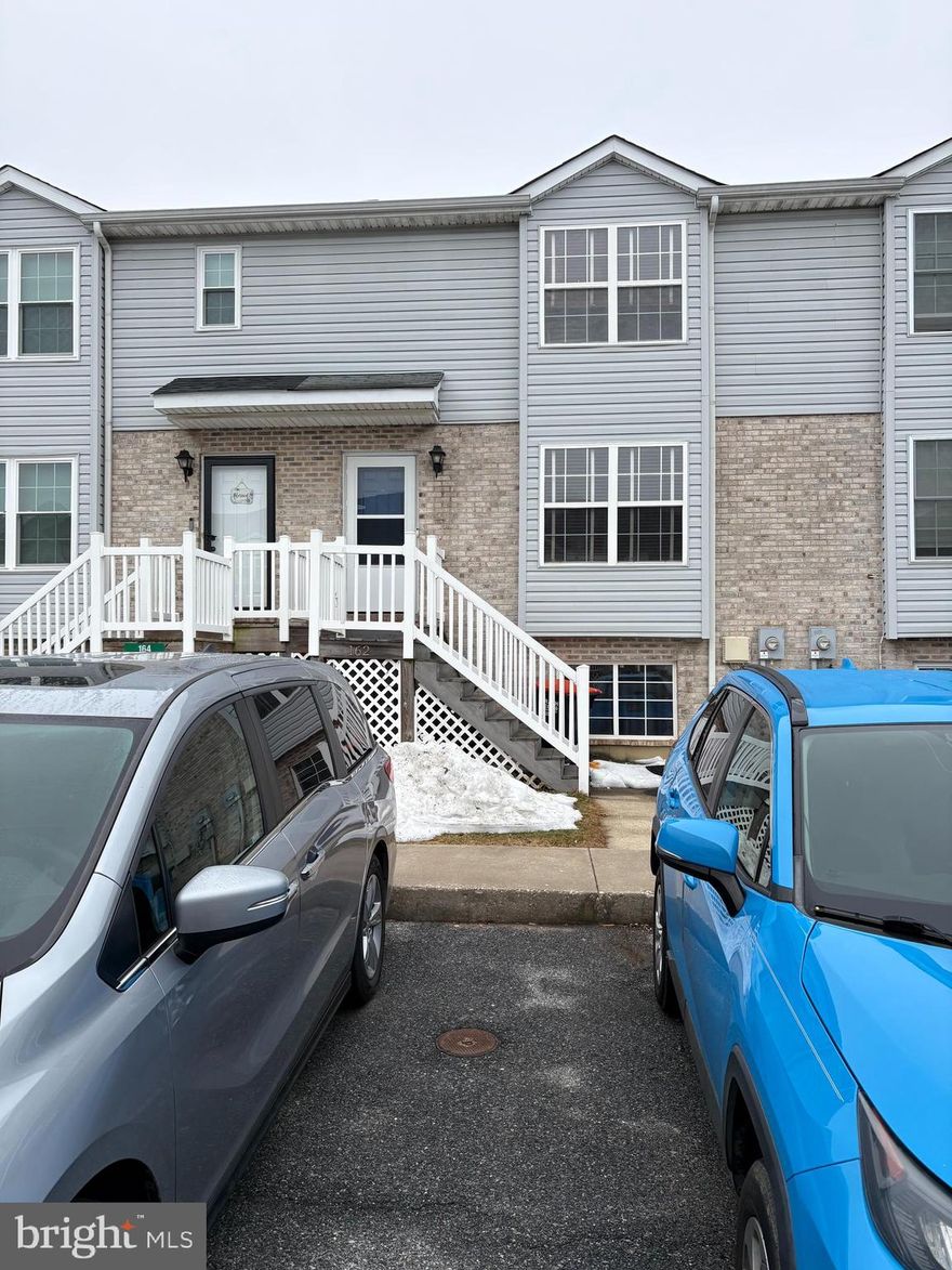 Beautifully maintained townhouse in desirable Middletown Village. This home features a spacious living area filled with natural light, an inviting eat-in kitchen perfect for everyday meals or entertaining, and a partially finished basement offering additional flexible living space.

Ideally situated near major highways, shopping centers, restaurants, and entertainment, this property combines comfort and convenience in a prime location.