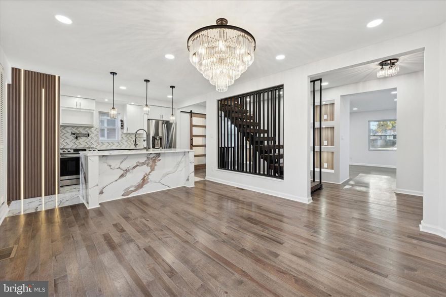 A Dutch Colonial masterpiece completely reimagined in 2025. Every inch of this home has been transformed with brand-new systems and finishes—including new HVAC, water heater, plumbing, electric, windows, doors, sewer lateral, and stainless steel appliances—offering the comfort and peace of mind of a brand-new build within a charming, established neighborhood.
Step inside to a bright, open-concept main floor where modern living meets timeless design. The gourmet kitchen features a large center island and high-end stainless steel appliances, seamlessly flowing into the dining area—perfect for entertaining and family gatherings.
The spacious living room features a custom built-in TV console and fireplace, creating a warm and inviting focal point.
Upstairs, you’ll find three generous bedrooms and a luxurious full bathroom with double vanity sinks, a soaking tub, walk-in shower, and a mounted TV, offering a true spa experience at home.
The finished attic suite serves as a private retreat—complete with a walk-in closet, full bathroom, and electric fireplace—ideal for a primary bedroom or guest suite.
The fully finished basement adds additional living space and includes a second washer/dryer for ultimate convenience. The main level also features a washer and dryer tucked right off the kitchen.
Outside, enjoy a new 2-car garage with additional driveway parking,  freshly installed windows and doors, and ample yard space perfect for outdoor entertaining.
With every major component brand new and thoughtfully designed details throughout, this home combines classic charm with modern luxury—ready for its next chapter.