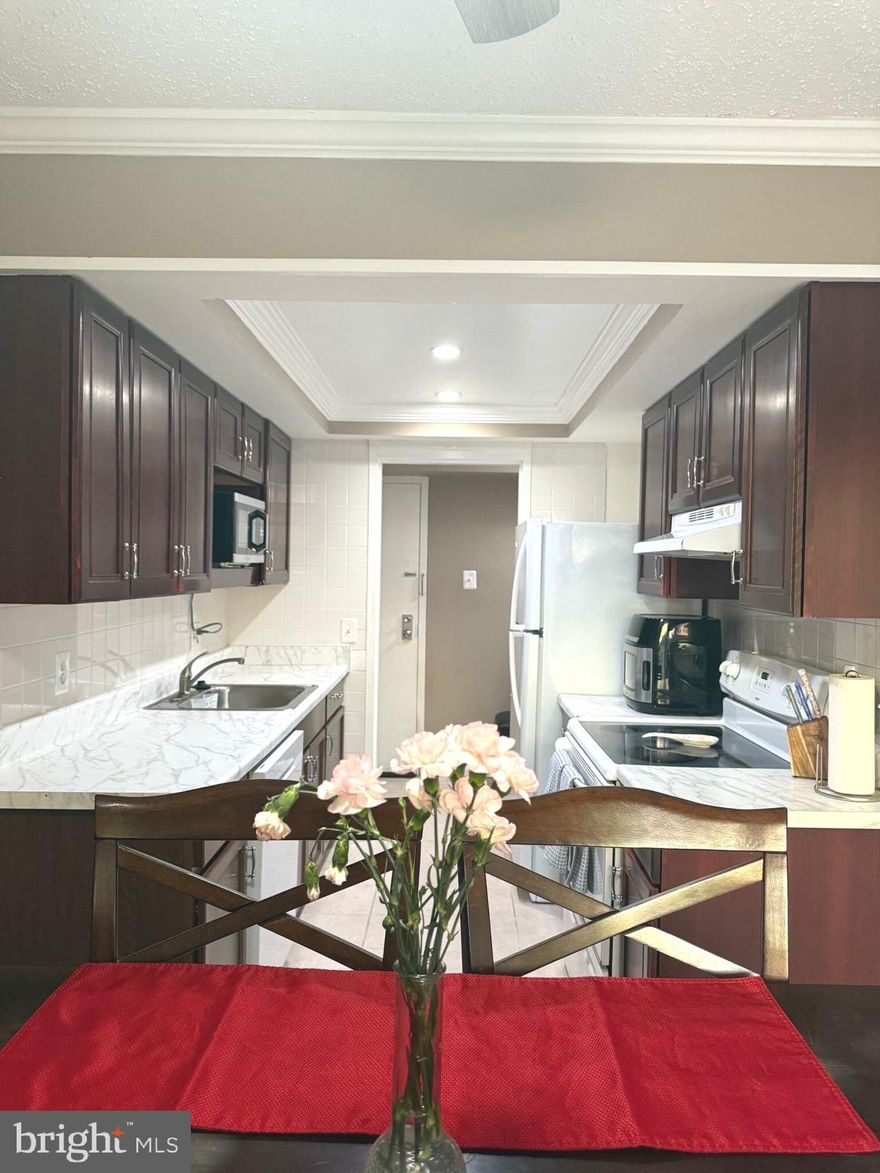 OPEN HOUSE Saturday- 12/14/24 from 1:30pm-5pm. Utilities included!!!  Beautifully renovated 2-bedroom, 2-bath condo in the sough after Shadowood Condominiums.  Offers a balance of comfort and convenience in the heart of Reston.  This property Highlights: Spacious Living Areas: Open-concept living and dining space with plenty of natural light and updated flooring. Renovated Kitchen: Modern design with stylish countertops, updated cabinetry, and standard appliances.  Spacious primary bedroom with en-suite bathroom and ample closet storage. Second Bedroom or guest room/home office, conveniently located near the second full bathroom. Relax outdoors in the private balcony, with serene community views. Updated Bathrooms: Recently refreshed with modern fixtures and finishes. Community Features: 2 Assigned parking spots for residents and plenty of visitor parking available. Access to Shadowood amenities, including a swimming pool, tennis courts, and a playground. Scenic walking trails nearby, connecting to Reston’s expansive green spaces and parks. Prime Location: Located minutes from Reston Town Center, with its shopping, dining, and entertainment options. Convenient access to the Metro Silver Line, Dulles Toll Road, and Fairfax County Parkway for easy commuting. Surrounded by parks, golf courses, and lakes, offering endless outdoor recreation opportunities.  Available: January 1, 2025 Don’t miss this chance to live in a beautifully updated condo in one of Reston’s most sought-after communities. Schedule a tour today! Tenants pays for internet and cable if wanted! Small pets ok.