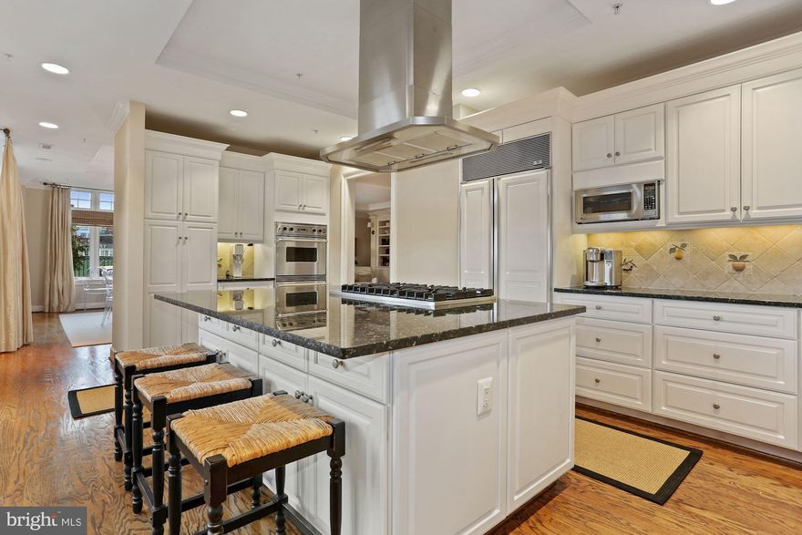 Price adjustment! Gorgeous 2,750 sq ft, 3 BR, 2.5 BA penthouse apartment with unparalleled indoor/outdoor living! This stunning apartment features an open living/ dining room with built-ins and crown moulding, a spacious kitchen with large center island that opens to a den/ family room with built-ins, powder room, two expansive terraces that are perfect for outdoor entertaining, a lovely primary bedroom suite with built-ins, walk in closet, and spa-like bathroom, two additional bedrooms, hallway full bathroom, laundry room, and ample closet storage. This apartment also includes one storage unit and three parking spots! Showings by appointment.