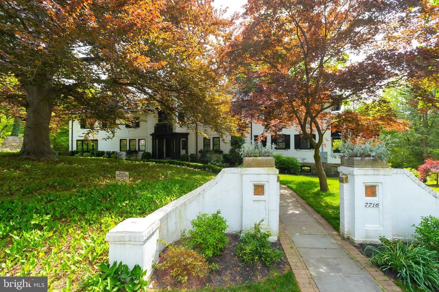 Welcome to 7716 Navajo --  This stately home built in 1925 on a coveted quiet Chestnut Hill block has been fully renovated with all the benefits of new construction while retaining the details of a truly elegant Chestnut Hill house built over 100 years ago.  Enter into a grand entry foyer with gorgeous new hardwood floors in a herringbone pattern and arched French doors leading out to rear patios affording incredible natural light  A true chef's eat-in kitchen complete with custom cabinetry and open shelving, contemporary quartz countertops and island with seating for 4, Sub-Zero/Wolf appliances including windowed refrigerator, double wall ovens, wine refrigerator ideal for entertaining.  Lovely casual dining area with ship-lap and glass cabinets for wine storage.  Convenient full-sized laundry room with side by side washer/dryer, custom cabinetry and countertops.  Lovely dining room plus an Elegant living room with new coffered ceiling, custom built-ins, gas fireplace and French doors leading to rear patio and gas Off the living room is a lovely enclosed sun porch which if perfect for all year round enjoyment.  Powder room completes this living floor. Ascend to the second floor with one entire side of the floor encompassing the fabulous master suite oasis.  Large master bedroom with cathedral ceiling and French doors leading to sept-ot balcony overlooking the rear grounds and tree top views.  Fabulous spa-like Master Bathroom with oversized step-in shower, custom double vanity with carrara marble sinks, wall faucets, and an elegant free-standing soaking tub.  Dressing room complete with custom built-ins. Down the hall are 2 additional large suites plus a convenient hall laundry closet with stackable washer/dryer.  Third floor features guest quarters with bedroom, full bathroom and sitting area. Partially finished lower level provides flexible space for media room/play room/home gym/office plus a new powder room. All new systems including new plumbing, new electric plus new roof.  2-car attached garage. Lovely grounds and a fabulous location on a quiet tree-lined block yet just a short stroll from Germantown Avenue and the train.  Convenient to Center City, transportation, major highways and the suburbs.  Approved 10-year tax abatement. Truly exceptional.