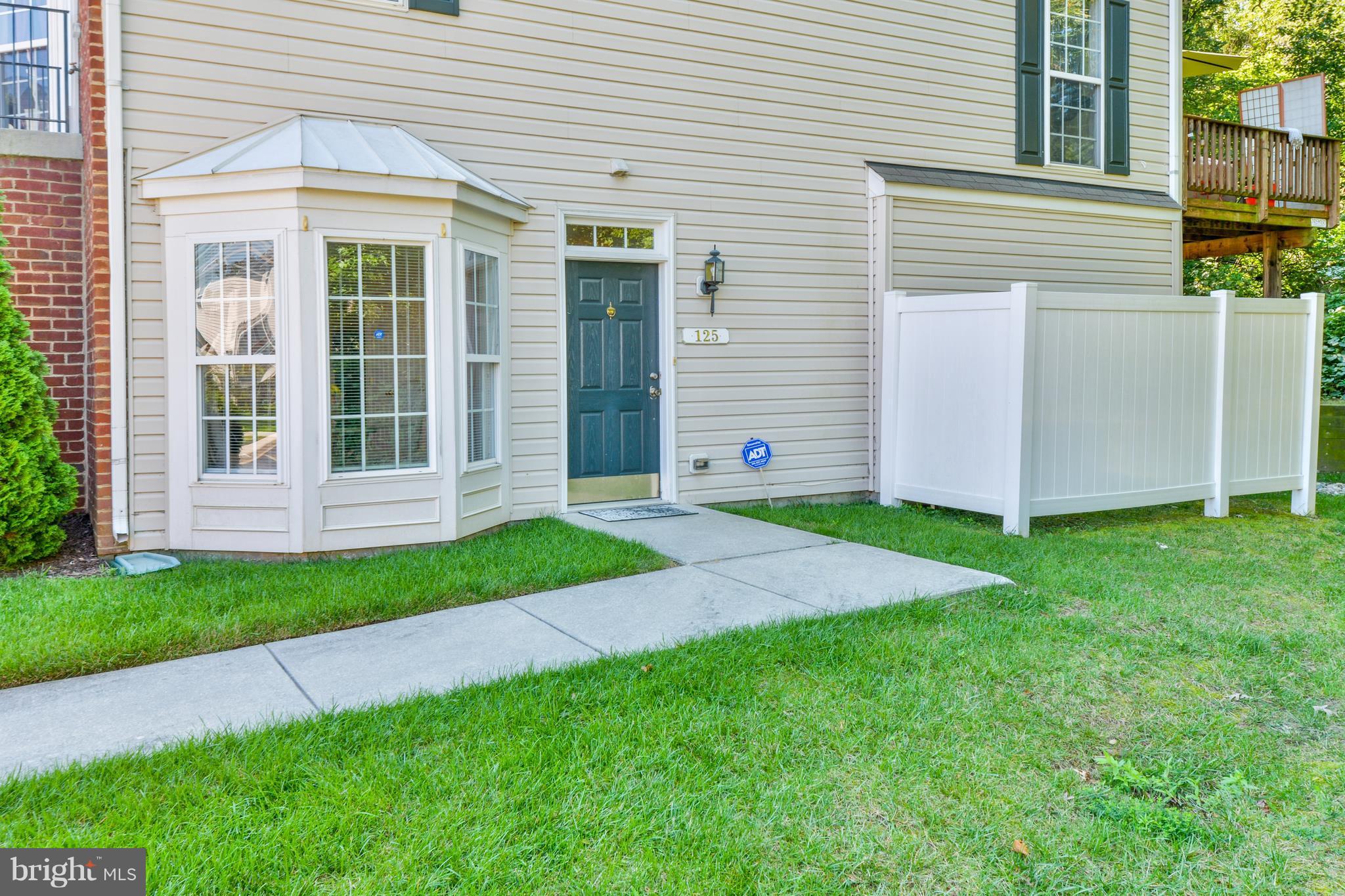 Charming and Pristine!. End unit with soaring 9 Ft ceilings. Newly installed floor and granite counter top for new buyer with Large galley kitchen and walk in bay dining area. Oversized master bedroom with private bath. This home shows very well and is truly move-in condition. Located in a gated community. No water and sewer bill..