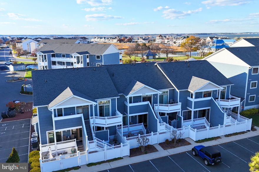 Welcome to 201 S Heron Dr #12E in the Harbour Club Community.
Discover the perfect coastal retreat in North Ocean City, Maryland, with this beautifully maintained 2-bedroom, 2-bath end-unit condominium filled with natural light and inviting living spaces throughout.
The spacious living area provides the perfect spot to relax or entertain, leading seamlessly to the dining area and updated kitchen featuring white cabinetry, stainless steel appliances, including a vine cooler, and a stylish glass tile backsplash. The primary suite offers comfort and privacy with an en-suite bath, while the second bedroom and full hall bath provide space for family or guests. Additional highlights include updated bathrooms, luxury vinyl plank flooring, and tasteful coastal décor throughout.
Step outside to your private balcony and patio, perfect for enjoying morning coffee, coastal breezes, or relaxing evening sunsets.
Harbour Club delivers resort-style amenities, including community pools, tennis courts, and a clubhouse, all just moments from popular restaurants, shopping, and everything Ocean City has to offer.
This unit in 2025 had a rental income of $25,000, this property presents an excellent opportunity as a vacation getaway, year-round residence, or income-producing investment.
Don’t miss this opportunity, schedule your private showing today and experience the Harbour Club lifestyle for yourself.