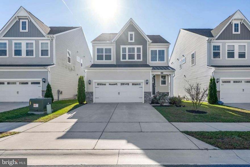 Welcome to your dream home in one of the area's most sought-after resort-style communities! This beautifully maintained 3-bedroom, 2.5-bath home is just 4 years young and offers the perfect blend of luxury, comfort, and convenience. Step inside to discover a bright and open-concept layout that seamlessly connects the kitchen, dining, and living areas—ideal for entertaining or cozy family nights. The gourmet kitchen features a spacious island, abundant cabinetry, sleek stainless steel appliances, and luxury vinyl plank flooring throughout this beautiful area. Enjoy morning coffee or evening sunsets through French-style doors that lead to a private deck overlooking a serene open area—your own peaceful retreat. The main floor primary suite offers a spacious walk-in closet and a spa-like bath, providing a quiet escape from the day. Upstairs, a versatile loft area awaits, along with two additional bedrooms, a full bath, and a flex room perfect for a home office, playroom, or guest space. Need more room? The full basement is ready to be finished, with a bathroom rough-in already in place, giving you the opportunity to double your living space and customize it to your lifestyle. Best of all, this home comes deeded with a golf membership, and within minutes walk to the closest clubhouse and pool, giving you access to world-class amenities right in your backyard. Whether you're starting a new chapter or looking for a relaxing getaway, this home has everything you need—and more.