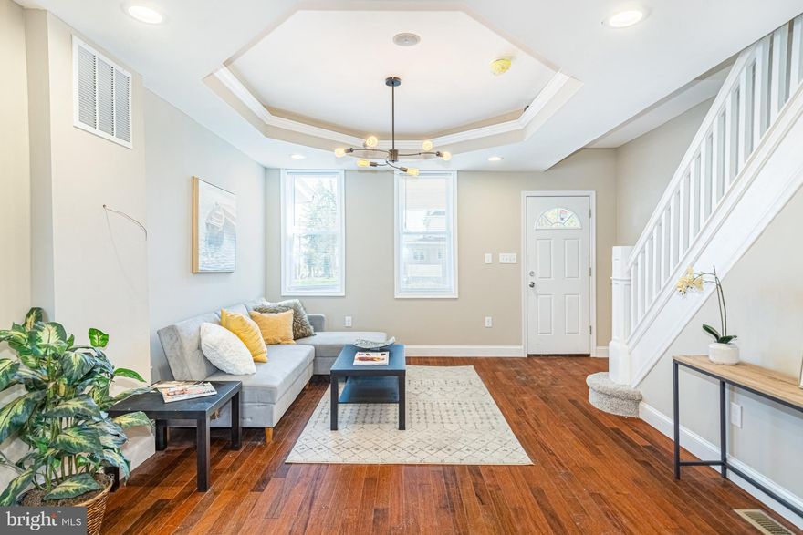 CUTTING EDGE RENOVATION WITH 3 FINISHED LEVELS OF LIVING SPACE!  Open floor plan featuring a spacious living room w/ tray ceiling, gourmet island kitchen with granite counters, ss appliances, & tile backsplash, main level half bath, upper level with 3 bedrooms and 1 full bath, finished basement with a family room, 4th bedroom and 2nd full bath, and a large yard with a privacy fence!  Pack your bags and move right in!