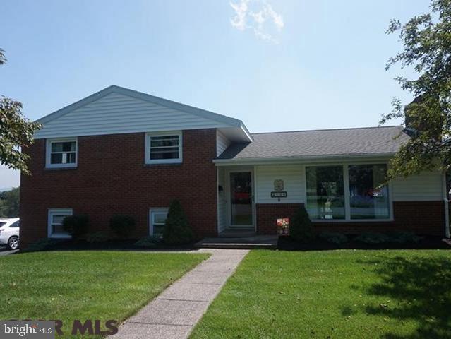 Sheer Delight on West Street. Heartwarming split-level in a peaceful subdivision in the quaint town of Pleasant Gap. This one owner home has been meticulous maintained inside & out. Delivering eye-catching curb appeal & an impeccably manicured lawn. Inside you will find a welcoming foyer, lovely living room & a delightful dining room with slider to the rear covered patio with views of neighboring mountains. The spacious kitchen boasts solid oak cabinets & lots of countertop space plus a handy breakfast bar. Upstairs you will find 3 well-appointed bedrooms & a full family bath with a dual vanity. The lower level offers a Rec Room, laundry room, half bath & a convenient mud room. Additional highlights include an integral 2 car garage, replacement windows, new flooring in the kitchen & dining room, 2 split systems for air conditioning (added in 2010) & oil hot water heat.