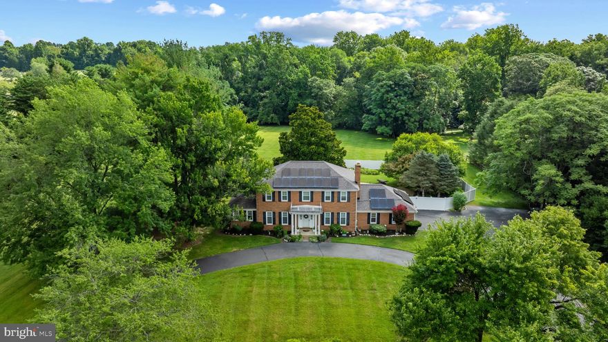 Estate like setting frames this traditional home located in the heart of Davidsonville. Situated on a 2.11 acres and buffered by the adjoining land owned by Foxhall Estates Homeowners Association. This exceptional property is freshly painted and ready for new  owners. The former model home includes a library addition.  The upper level boasts 4 generous sized bedrooms and 2 full baths. Enjoy carefree summer fun with parties centered around a gorgeous pool. Store your patio furniture in the custom shed,  The main level suite with living room, bedroom, full bath, kitchenette and separate entrance is perfect for multigeneration living or an in-home office. The full basement with walk up entrance is ready to be finished or used for storage. The roof was replaced in '21, Windows, gutters and siding in 2010, deck and fence in'24. Solar panels are owned. Enjoy tranquil living with an easy commute to DC and convenient to charming local restaurants and shopping .