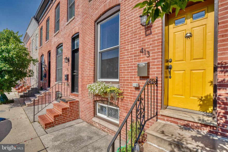 Welcome home to a remarkable home in the center of it all! Renovated and ready for you. Step into the main floor with a completely open floor plan featuring gorgeous hardwoods leading to an updated kitchen with granite counters and high end cabinets. Just a perfect central meeting place for the home. Upstairs you'll find two large bedrooms with two fantastic updated bathrooms. Step out onto your balcony deck for a cup of coffee in the morning, and head up the steps to the expansive freshly updated rooftop deck for city views in the evening. Prime fireworks viewing! Slip downstairs to the basement for more living space and yet another full bath, along with solid storage space. The backyard is completely enclosed and a nice place to escape the day. All blocks from Patterson Park, Highlandtown, the Square, you name it. It's a good life!