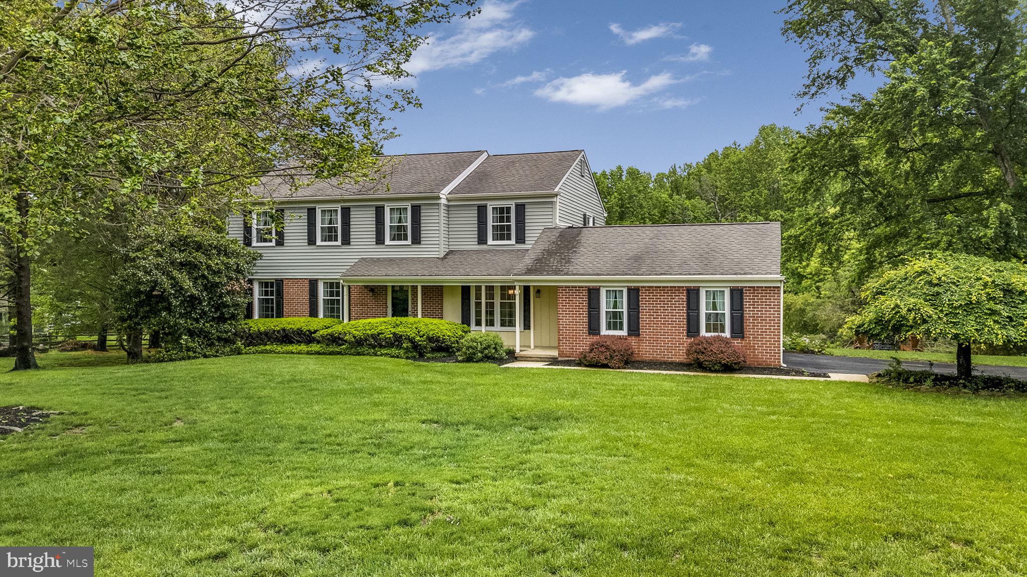***OPEN HOUSE CANCELLED FOR 5/18***. Property is under contract Enjoy the perfect blend of space, privacy, and style in this beautifully updated 4-bedroom, 2.5-bath colonial nestled on a sprawling 1.3-acre lot in sought-after West Chester. Set back from the road and surrounded by mature trees, this home offers the peace and privacy you’ve been looking for—while still being close to everything. Step inside to find fresh paint, brand new carpet, and a bright, inviting layout. The large kitchen features granite countertops, stainless steel appliances, a center island, and plenty of space for cooking and gathering. The main floor offers flexibility with both a living room and a cozy family room, plus an updated powder room and dining room. Upstairs, the spacious primary suite includes a walk-in closet, a separate vanity area, and a stylish en-suite with a tiled shower. Three additional bedrooms—each generously sized—share a large hall bath with a double vanity and new flooring. Need even more room? The finished walkout basement provides multiple large living areas perfect for a media room, playroom, gym, or office, along with a big storage room and utility closet. Outside, enjoy the privacy of your expansive 1.3-acre lot, complete with a large two-car garage and plenty of room to garden, entertain, or simply relax in nature. Additional upgrades include new windows and double-entry French doors (2022). Don’t miss this rare opportunity—schedule your showing today and discover everything this move-in ready gem has to offer!