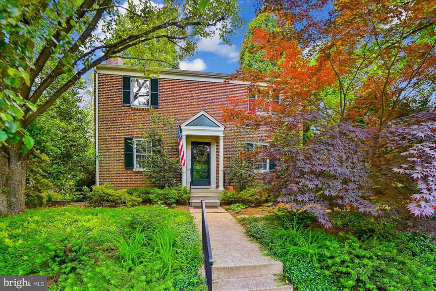 We all know those homes – the ones where you walk in and can immediately sense the good karma.  This is one of those homes.  It has been loved and cared for by its owners for the past 36 years.  If the walls could talk, they would tell you what a treat it has been living here .  One of the few detached brick colonials backing up to a Rodgers Forge alley, this is the ideal setting – part of the ‘Forge’ but detached with an unbelievable yard.  A traditional floor plan includes a large living room with custom built-in cabinets and a gas fireplace.  A formal dining room is complemented by an updated kitchen that was thoughtfully designed by a chef who knows what is important!  What most Rodgers Forge homes lack, this one has – a first floor powder room and upstairs –  a primary bedroom and bathroom, along with two more bedrooms and another full bathroom.  Check those boxes – your wishes have come true.  The lower level feels just as good with a large recreation room, another half bathroom and the most organized utility room you can possibly imagine.  We are just as smitten with the yard as we are with this home.  It is a sanctuary of entertaining space, garden space and room to play.  Mature trees and specimen plantings surround the patio; its ideal for quiet afternoons or festive evening gatherings.  And the icing on the cake – parking!  Yes – a dedicated parking space that is camouflaged and tucked away – yet convenient enough to bring in your bags and groceries.  More boxes, more checks.  The owners of 311 Stevenson Lane have been meticulous in their care (and record keeping) of this home.  It has been lovingly maintained  - and you will feel it the moment you walk in the front door.  Come in and be delighted!