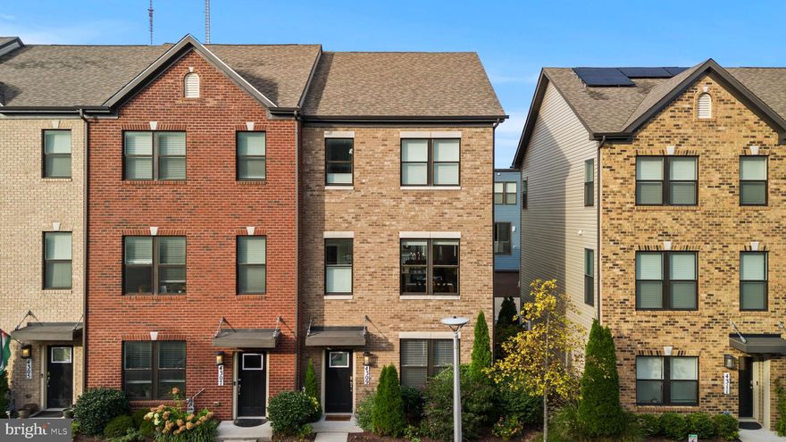 Welcome home to 4309 Laplata Ave., a contemporary 3 Bedroom 3.5 Bathroom end‑unit brick‑front townhome tucked within the Roland Heights/ Medfield Community. Adjacent to Medfield Elementary, redesigned in 2019/2020, and with its modern design, 2,040 sq ft, and prime location, this home delivers urban lifestyle with neighborhood charm.  The location within the community and end-unit design offer extra windows that bathe the home in natural light and the benefit of only one shared wall for enhanced privacy. A light‑filled entry foyer welcomes you with a versatile home office/den, full bathroom leading directly to your two‑car garage, and an open staircase sets the stage for the airy floor plan above. On the main floor you’ll be welcomed with generous living and dining areas anchored by a chef‑inspired kitchen. Quartz counters and an island provide ample prep space, while stainless‑steel appliances, a pantry and modern cabinetry complete the gourmet vibe. Luxury vinyl plank flooring flows throughout the living areas and baths, and the living room’s sliding glass doors extend the entertaining space onto the deck. A convenient powder room is tucked away on this level. The upper level hosts a serene primary suite featuring a walk‑in closet and a spa‑like bath. Two additional bedrooms share a well‑appointed hall access full bathroom and there’s a laundry closet for added convenience. Wall‑to‑wall carpeting lends warmth underfoot in each bedroom. Hampden’s vibrant retail and dining corridor is a short stroll away, and downtown Baltimore is only an 8–10‑minute commute. Union Collective, a redevelopment of a former Sears warehouse into a 155,000‑sq‑ft hub of independent businesses, breweries and community spaces, is nearby as well. A visit to the Baltimore Zoo and Jones Falls Trail are a short drive from your new home. Johns Hopkins University, Sinai Hospital and the Rotunda retail complex are also minutes away. Schedule a tour to experience this exceptional home!