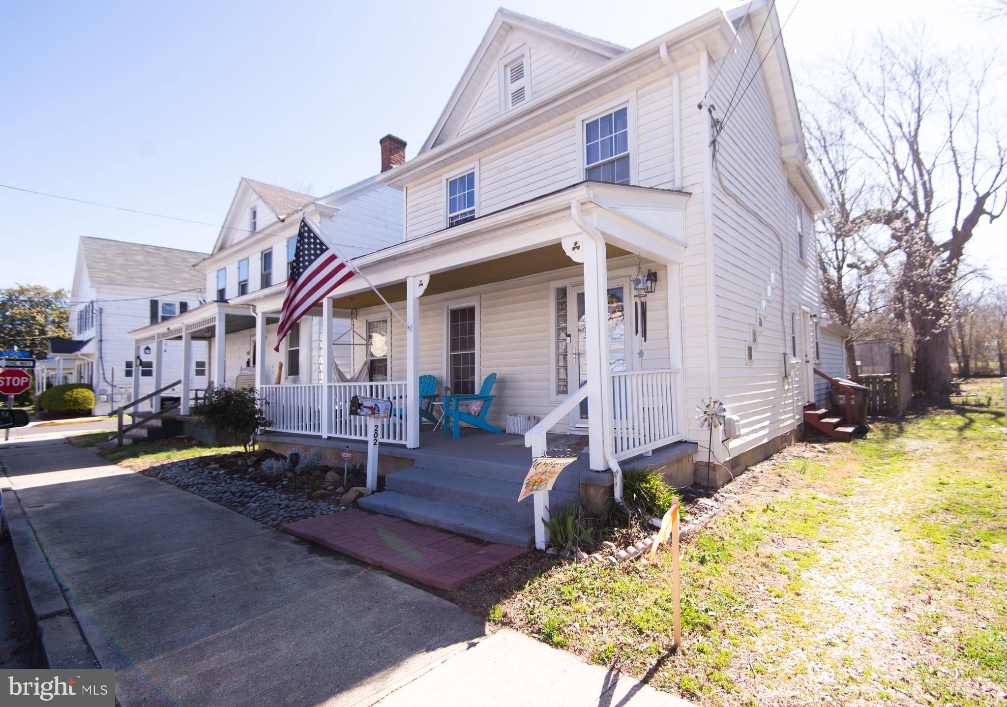 Welcome to Your Charming Historic Retreat Just Steps from the Choptank River!
Step into this delightful 3-bedroom, 1.5-bath home, perfectly situated just two blocks from the tranquil Choptank River. This property is rich in character and offers an array of features that truly make it a gem.
As you approach, the expansive covered front porch invites you to enjoy your morning coffee while soaking in the peaceful surroundings. Inside, the home showcases historic charm with an open floor plan adorned with beautiful hardwood floors. The spacious living room seamlessly connects to the separate dining area, which features a cozy pellet stove and a well-appointed kitchen—creating an ideal space for entertaining friends and family.
Gather around the breakfast bar that overlooks the kitchen and dining room, where you can share stories and laughter about your day. Just off the kitchen, a cozy study or office nook awaits, enhanced by a skylight that floods the space with natural light—perfect for those who work from home or need a quiet spot for reading.
Conveniently located on the main floor, a half bath and a sought-after laundry room simplify daily chores. Additionally, a flexible space tucked away near the living room and dining area can be transformed into a game room, family room, or craft area—limited only by your imagination!
The grand staircase in the living room, or the charming back stairs tucked away off the kitchen, lead you to the upper level, where you'll discover three generously sized bedrooms and a full bath. This layout provides ample space for family or guests, ensuring everyone feels comfortable and at home.
Step outside to find a large fenced backyard, adorned with mature landscaping, serving as an idyllic sanctuary for relaxation and outdoor gatherings.
With its prime location within walking distance to Long Wharf, the Choptank River Lighthouse, Great Marsh Park, and the vibrant downtown area filled with charming restaurants and shops, this home beautifully combines tranquility with convenience.
Don’t miss your chance to own this enchanting historic home—where comfort, style, and location come together beautifully!