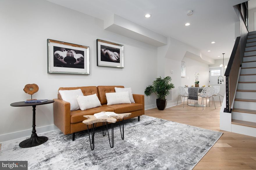 BEST AND HIGHEST OFFERS DUE 10am, February 7th, 2023. 

Welcome to 411 E Federal St, one of three homes masterfully designed on the same block. This property is a complete renovation with tasteful modern finishes by a prominent builder. First floor welcomes you with beautiful matte finish natural blond wood floors, paired with exposed brick, modern light fixtures,  contemporary kitchen with European style open shelving, custom backsplash, crisp quartz countertops and brand new appliances.  Second floor offers two bedrooms with edgy bathrooms with trendy octagon tile, modern vanities and cool fixtures. Off-street parking makes your life easy and stress-free. Located in lively neighborhood of Greenmount West.