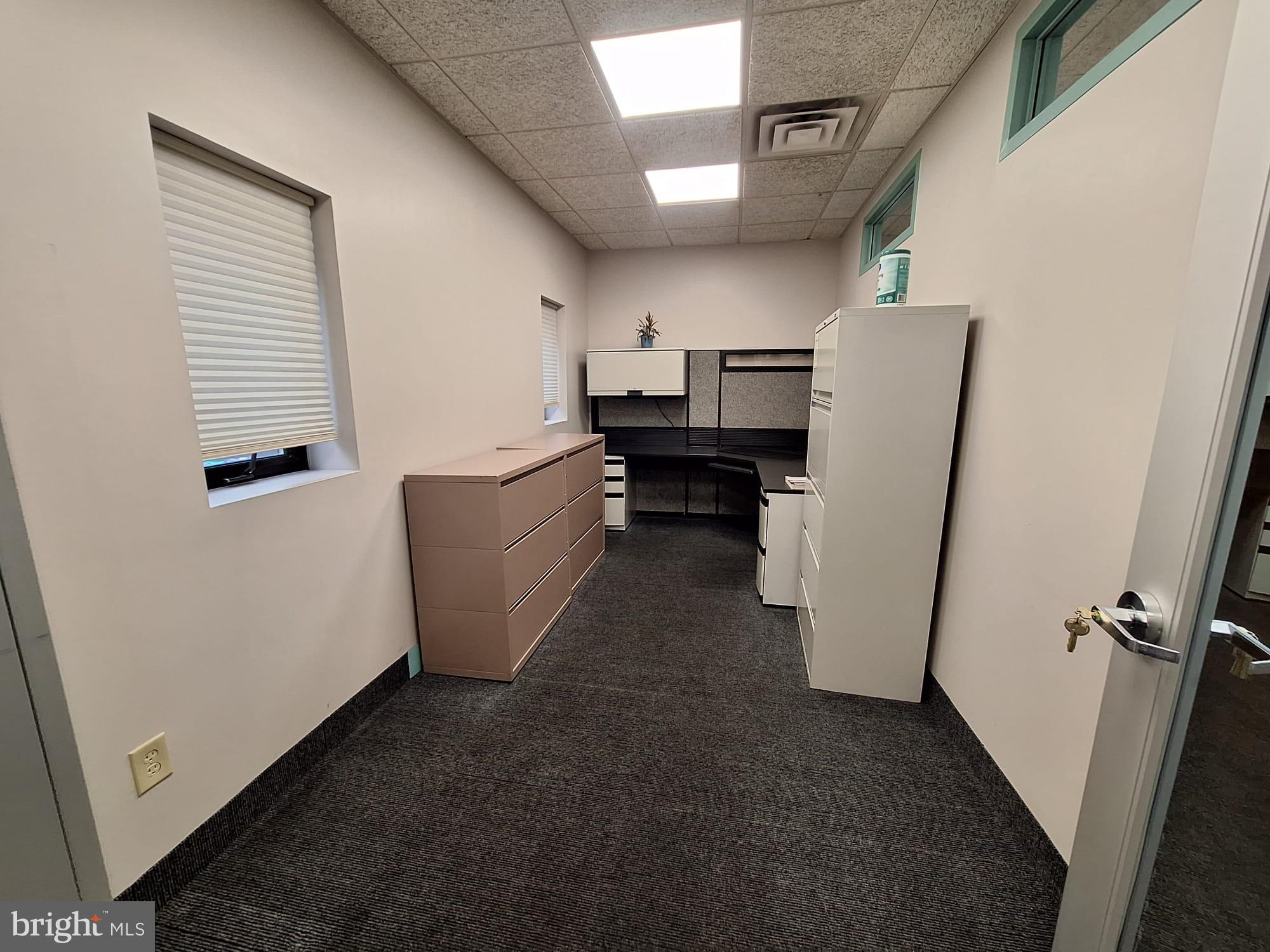 Office space available in Industrial Building. Conveniently located between Chester Pike and MacDade Blvd. Office is 144sqft with two windows for $800/month + Double Net (A double net lease is part of a rental agreement whereby the tenant agrees to cover the costs of taxes and utilities). Office has been furnished with a desk, cabinets, and sitting furniture. Building has a foyer waiting room and CCTV throughout. Building is also armed 24/7 with an alarm system that is monitored.