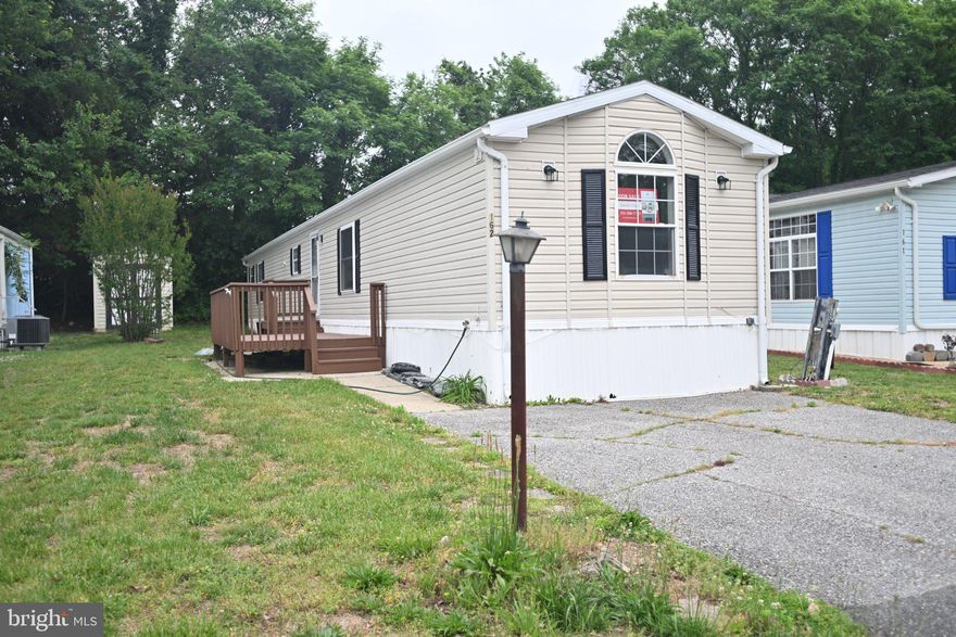 NOTE: Buyer must be approved for Community Land Lease.  Beautifully maintained and exceptionally spacious manufactured home in sought-after Boones Estates! FULLY RENOVATED! MOVE IN CONDITION.  Open floor plan for comfortable living.  Large Kitchen Island. Kitchen and Bathrooms are nicely redone.  The open concept kitchen with Quartz counter tops.  Large Master Bedroom with private bath, plus nicely sized secondary bedroom. Deck on the side.  Shed in the back. Off street parking for 2 cars. Community amenities include pool, playgrounds, basketball and tennis courts. Conveniently located near Route 4 with easy access to Annapolis, DC, and Andrews AFB. Move-in ready and a must-see!
**Buyer must be approved by community for land lease**.  Seller Financing Available. Owner/Agent.