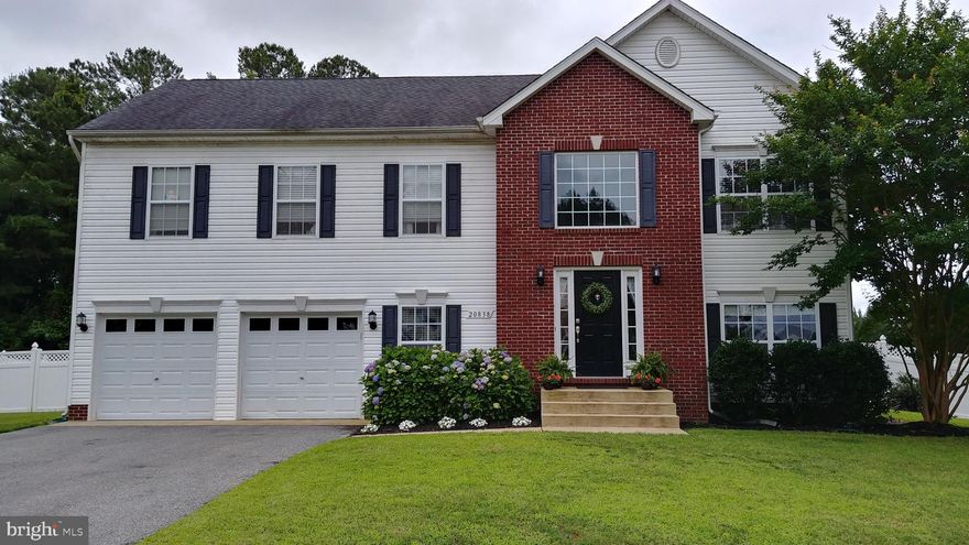 Original owner on this 4 bed/3 bath home on large corner lot in Cecil's Mill community! Enter the main level to find open concept kitchen, dining, and living room with 9 ft ceilings throughout and vaulted living room ceiling! Kitchen features stainless steel appliances, ceramic tile backsplash, and island. Other upgrades to main level include Pergo flooring, wainscotting, and crown moldings! Down the hallway, find 2 spacious bedrooms with generous closets, a full bath with dual vanity and a 3rd large owners suite featuring 2 separate walk-in closets. Enter into the beautifully remodeled ensuite bathroom featuring updated separate soaking tub and walk-in shower, dual vanity, and linen closet. Lower level features a large open living space/multipurpose room with tons of built-in shelving, a 4th bedroom, 3rd full bathroom, and the laundry room. From the lower level, enter the oversized, extra deep 2-car garage with built in shelving! Outside, find an oversized composite deck off of the kitchen/dining area overlooking the level, fenced in back yard which backs to trees and features newly planted grass, perfect for entertaining. Storage shed in backyard conveys. Lower level of home wired for in home speakers which were previously used for lower level theater room.  Tons of storage throughout!!! Community features a playground, basketball court, and picnic area. Conveniently located to PAX River naval base, restaurants, shopping, and schools, yet in a serene community. Come see this one for yourself!