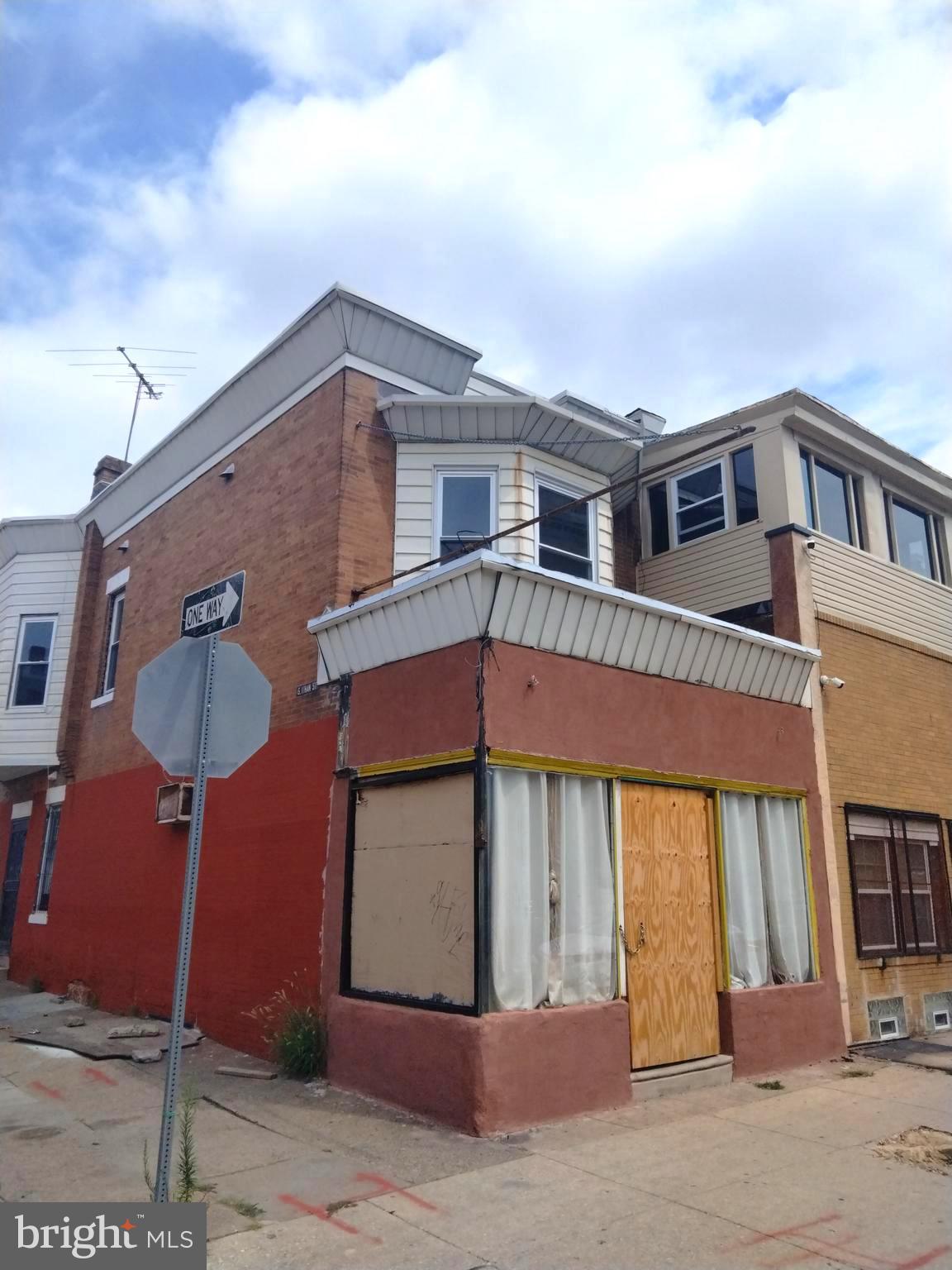 Check out this Mixed used property in need of its finishing touches located in the Southwest Corridor of Philadelphia, which is now being branded as Philadelphia Africatown. This mixed-use property is currently planned as a Storefront w/ two residential apartment units. The storefront possibilities are endless. Examples could be Daycare, Restuarant, Convenient Store, Hair Store, Home Health Agency, Resource Center, etc. Also, this property could quality for a first-time homebuyer rehab loan. The main construction items have already been installed such as electrical, plumbing (Including fire alarm system), framing, and newer roof. Investors and Entrepreneurs you have the potential to make over $5K per month. Don't let this business opportunity pass by you come check it out today.