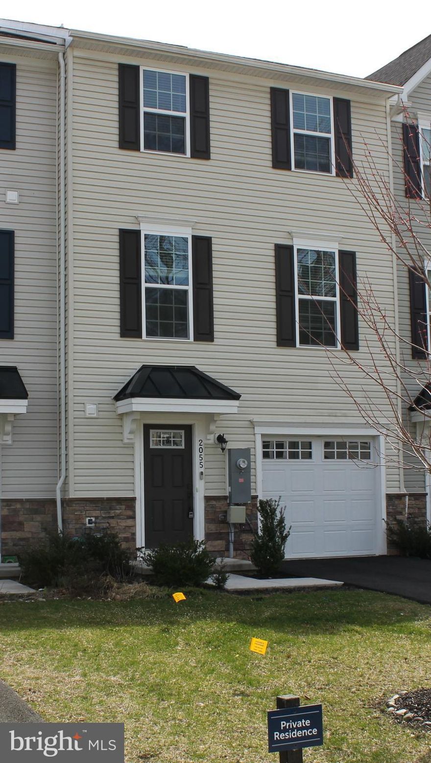 Welcome to Whitewood Village, where style, comfort, and convenience come together in this beautiful, turn-key, four-year-young townhouse. Lovingly maintained and used only as a second home, this residence offers a truly pristine interior and exterior with modern finishes and an abundance of natural light throughout its spacious three-story layout. Enter inside the ground level and you’re greeted by a welcoming foyer—perfect as a drop zone for coats, shoes, and bags. This level also features a convenient half bath, interior access to the one-car garage, and a versatile living room with sliding doors leading to the rear outdoor space. Upstairs, the main level showcases a bright, open-concept floor plan designed for today’s lifestyle. The expansive family room flows seamlessly into the eat-in kitchen, complete with high-end, energy-efficient stainless steel appliances, a generous island with seating, ample cabinetry, and a pantry for added storage. The dining area is perfectly positioned and features sliding doors that open to a private, south-facing deck—an inviting space for morning coffee or evening gatherings. The third floor offers three spacious bedrooms, including the primary suite with a walk-in closet and a private ensuite bath featuring a walk-in shower. Two additional bedrooms share a full hall bathroom, and the conveniently located laundry area completes this level for everyday ease. Ideally situated with easy access to shopping at Christina Crossing, a variety of dining options, nearby parks, and the University of Delaware. Commuters will appreciate quick access to I-95 and Route 1, making travel to Wilmington or Philadelphia effortless. Mortgage savings may be available for buyers of this listing.