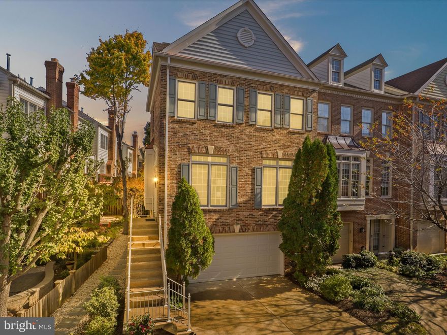 Looking for more space while staying close to nature and DC? This updated end-unit townhouse in the sought-after Stonegate community is the perfect fit! Located on a quiet no-through street, you'll enjoy a friendly neighborhood vibe. Inside, the home shines with beautiful landscaping and a model-home feel. The upper level features two primary bedrooms, while the lower level includes a third bedroom that can serve as a home office or family room, complete with its own full bathroom, walk-in closet, and backyard access. The Owner's Suite boasts a tray ceiling and a fully upgraded bathroom with new fixtures, a soaking tub, and a frameless shower. The secondary bedroom fits a queen bed and has its own ensuite bathroom. Large windows in the living and dining areas let in plenty of natural light, highlighting the hardwood floors. Freshly painted throughout, the kitchen was completely remodeled in 2022, featuring new cabinets, quartz countertops, stainless LG appliances, and a breakfast island. There's also a cozy eat-in lounge area with a 60” LG flat-screen TV (which conveys), and the fireplace has an elegant new marble surround. Host gatherings on your spacious deck overlooking a serene common area, or enjoy the newly built lower-level deck, perfect for nighttime entertaining. The lower level offers privacy for guests or family members and includes a newer full-sized washer and dryer. Stylish touches like transom windows, chair rails, and new lighting fixtures add charm. The two-car garage features a painted epoxy floor, and a Level II EV charger was installed in 2024. This smart home is equipped with a Nest thermostat and alarm system, and the HVAC was replaced in 2022. Enjoy community amenities like a pool (membership available), a tot lot, and tennis courts, all within walking distance to historic Fort Ward Park. With plenty of shopping and dining options nearby, plus easy access to Capital Bikeshare and Metro/Dash bus service to the Pentagon, you’re just minutes from downtown DC and National Airport. This is the one!