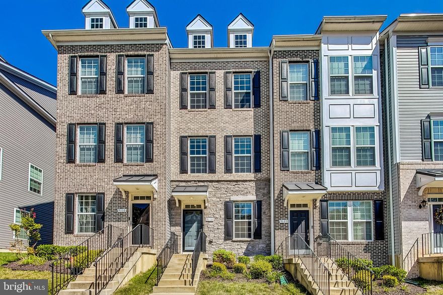 Built in 2018, this pristine 3-level townhome offers modern luxury and convenience. Step into a welcoming formal living room on the main level, with easy access to a rear car garage. The second level features an  open-concept layout with a spacious living room, a gourmet kitchen with an eat-in island, stainless steel appliances, sleek countertops, and a stylish dining area. Enjoy outdoor living on your private deck, perfect for al fresco dining or a morning coffee.

The third floor is dedicated to relaxation, with two generous bedrooms including a primary suite that boasts his and her closets and a luxurious en-suite bathroom. A convenient washer and dryer are also located on this level and a second bedroom with its own private bathroom.

Community amenities are fantastic and located within the neighborhood! Enjoy access to a gym, a sports lounge, game and theatre rooms, multiple pools and kids' playgrounds!

Situated in a prime location, this home offers easy access to DC, National Harbor, Joint Base Andrews, and Alexandria!