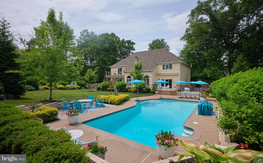 3 Turnberry Way  has been completely updated including - new kitchen, all 4 full bathrooms updated, new roof, new driveway, new deck, generator, HVAC, floors refinished and carpeting. Public Sewer and a Clean Stucco Test and Well Water. 
As you enter, you will notice the center hall has views through the house into the backyard with a pool. On either side of the foyer are the formal dining room with wainscoting, crown molding, beautiful light fixtures and sconces. To the right is the formal living room with crown molding and a warm grass cloth wallpaper. To the rear of the home is the large eat in kitchen with views to the side yard - a fenced in dog run that has been planted with evergreens, hydrangeas and rose bushes. The kitchen was updated in 2022 with grey tone cabinets, Wolfe cooktop, white quartz countertops, an island that seats three comfortably, and a beverage fridge dry bar.  The kitchen also has a large eat in area.  Adjacent to the kitchen is the great room that has two steps down and a large stone fireplace that goes floor to ceiling that has a gas insert. Down the hall you will find an owners entranced lined with shiplap, a large laundry room that is bright and provides ample folding space. Next is a full bathroom with a shower next to a very large first floor bedroom with two areas big enough for a king size bed and a sitting area. There is also access to the back deck from this room. Off the owners entrance you will find the garage which is a few steps down from the house. Up the stairs off the main hall you come upon a double door entrance to the graciously sized primary bedroom, with windows and doors to a balcony overlooking the backyard. You will notice extensive millwork in the ceiling and drapery boxes that hide the remote controlled blackout curtains. The primary bathroom has been completely renovated with custom cabinetry, heated marble inlaid floor, oversized shower and Toto toilet with heated seat and bidet. There are also two walk in closets and a linen closet all with custom built ins. Upstairs you will find a large junior suite that has an updated bathroom with white subway tiles and shower. Down the upstairs hall that is open the the family room, you will find two more bedrooms with a Jack and Jill bathroom. The bathroom has been updated with a large double vanity with plenty of storage and a separate room with the toilet and tub shower combo. The basement is unfinished with tall ceilings. There is also a Bilco door to the side yard. The backyard is really the show stopper with this house. There is a brand new Trex deck with wire railings that run the length of the entire house with a balcony off the primary bedroom. The backyard has been meticulously planted with now mature plantings which include tons of Norway spruces, Green Giants, Dogwoods, Redbuds, Cherry, Bradford Pear and many other trees for beauty and privacy. There are a hydrangeas that line one side of the pool for a summer pop that is quite special as well as multiple mature rhododendrons and azaleas planted throughout the yard. Beyond what you can see in the landscaped grass, part of the yard provides a whole other world for you or your pets to explore. The perimeter of the yard is covered in wood chips to keep weeds and mud down. The entire back yard is fenced in with a split rail and deer fence.This home also has backyard sprinkler system, new driveway and deck, HVAC, roof and water heater have been replaced in the current owners. One of the owners is a licensed PA Realtor.