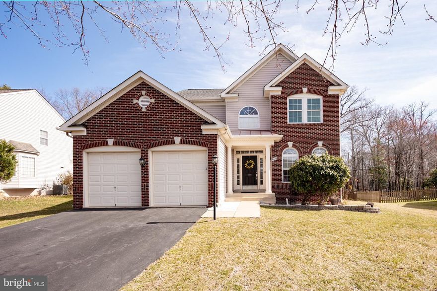 Welcome to The Forest at Southrun, a sought-after community in Springfield, known for its charming homes and unbeatable location. Nestled on a quiet cul-de-sac backing to trees, this 5-bedroom, 3.5-bathroom home offers over 3,600 square feet of thoughtfully designed living space.

Step into a grand two-story foyer with cathedral ceilings and a beautiful split staircase with new railings. Hardwood floors flow throughout the main level, where you'll find a formal dining room, living room, and a cozy family room with a gas fireplace. The open-concept kitchen is a chef’s dream, featuring Corian countertops, stainless steel appliances, a breakfast area, and walkout access to a large rear deck—perfect for entertaining.

Upstairs, the spacious primary suite boasts vaulted ceilings, a luxurious en-suite bath with a deep soaking tub, dual vanities, and a separate shower. Three additional large bedrooms complete the upper level.

The recently upgraded lower level features LVP flooring, a generous recreation room, a fifth bedroom, a full bath, and an updated utility room. With 9’ ceilings and walk-up access to the fenced backyard, this level is a fantastic bonus space.

This home has been meticulously maintained and updated to include: 
 brand new blinds (2024), new HVAC system (2022), new water heater (2022), SMART laundry machines (2023), SMART garage door opener (2022), new roof (2019), finished basement with new circuit breaker box (2021), radon mitigation system (2018), and refinished main level floors & stairs.

The HOA includes access to two tot-lot playgrounds, basketball courts, twice-a-week trash service, weekly recycling, and seasonal leaf removal.

Conveniently located with easy access to I-395, I-495, I-95, DC, VRE, Fairfax County Parkway, and Fort Belvoir. Commuters will love the short drive to the Gambrill Road Park & Ride Lot for Metro access to DC and the Pentagon.

This is more than just a home—it’s a lifestyle of comfort, convenience, and modern elegance.  Don’t miss out—schedule your private tour today!