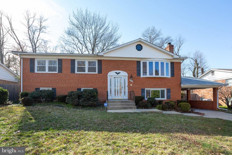 This Lovely 4 bedroom 3 bathroom home is one of a kind. This remarkably well maintained  home has hardwood flooring throughout the main areas of the home, fireplace on lower level, and updated kitchen with lovely granite counter tops. The master bedroom has an in suite bathroom and the room on the lower level is huge with a walk in closet area. This home also features a large basement for entertaining with a wet bar area that can be customized into a separate full kitchen by its new owner. Plenty of storage space! There is a deck and a huge back yard for all of your family and social affairs. What more could you possibly want as you drive into your carport of your new home! Home is being sold "AS-IS".