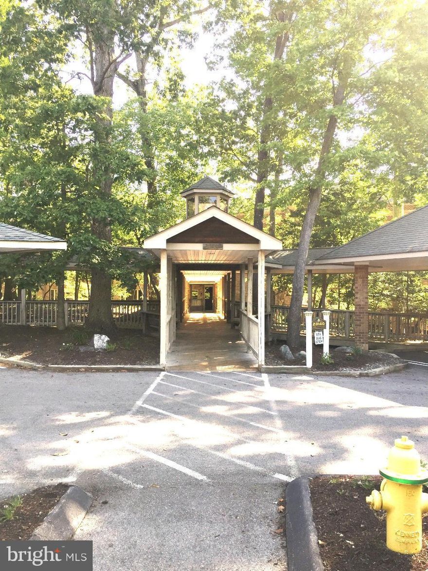 Wonderful ground level condominium in 55+ community.2 bedrooms 2 full baths. Separate dining room with a spacious living area. Dual vanities, separate large master shower, jetted soaking tub. Private patio that backs to trees. Cable TV, trash service, water and sewer are included. No more worries with lawn and/or building maintenance. Kick back,relax and enjoy all that Wildewood has to offer!