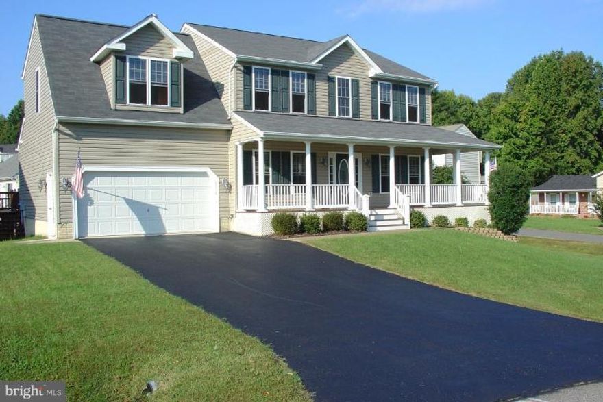 Nicely landscaped fenced corner lot with walk out basement, patio and deck in the back yard. Beautiful three finished levels with wrap around porch. Surround sound wiring in Master B/R,Family room,L/R,D/R and Basement. In-law suite in the basement with kitchenette. Close to shopping and commuter lot. Minor repairs in progress to be completed 02/07/2014. Contact listing agents for combo number.