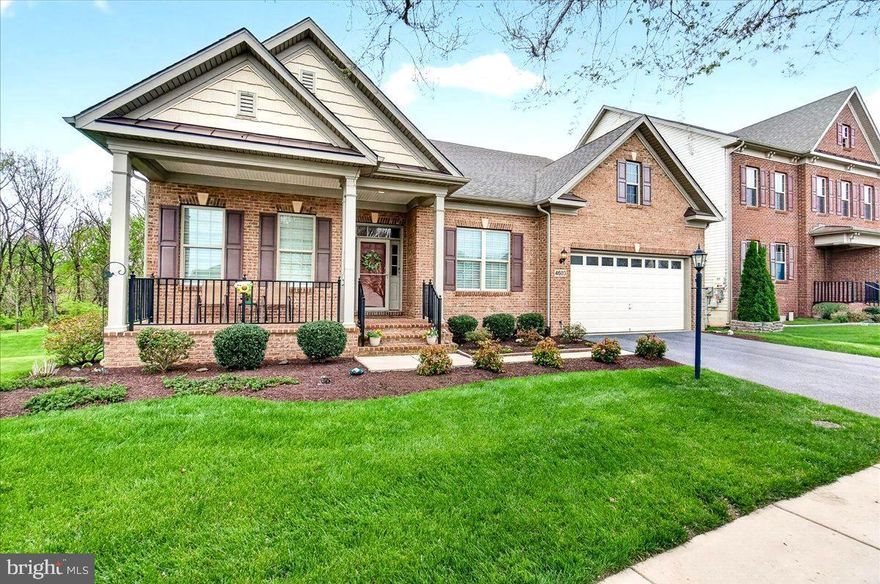 This stunning luxury ranch-style home located in the highly sought-after Landsdale community offers the very best in single-level living. Featuring 9-foot ceilings throughout, the home welcomes you with a gorgeous octagonal foyer, elegant crown moldings, and rich hardwood floors that set the tone for refined comfort.

The gourmet kitchen is a true centerpiece, boasting a gas cooktop, double wall ovens, granite countertops, rich cabinetry, and an expansive island ideal for entertaining. It opens seamlessly into a light-filled, spacious living area with a cozy gas fireplace and direct access to a large composite deck.

The primary suite is a private retreat complete with tray ceiling, a generous walk-in closet and a luxurious en-suite bath featuring a soaking tub, double vanities, and a walk-in shower.  A lovely formal dining room, two additional bedrooms, a full hall bath with tub, comfortable office/den, a mud room leading to an attached two car garage and a convenient laundry room round out the main floor.

A huge, finished walk-out lower level provides additional living space including a large recreation area, a fourth bedroom with walk-in closet, a full bath, a finished storage room, and a huge utility/storage area.

Outdoor living is just as impressive, with a spacious composite deck overlooking a beautifully landscaped lot, an attractive paver patio, and a welcoming covered front porch all perfect for relaxing or entertaining. 

The Landsdale community provides excellent schools, beautiful resort style community pool, meeting rooms, multiple playgrounds, ball courts, walking paths and scenic ponds. Convenient to I-270, I-70, and amenities offered in thriving Urbana and Historic Frederick. 

Elegant ranchers like this one do not come on market often so don't miss out! Virtual staging used in some photos.