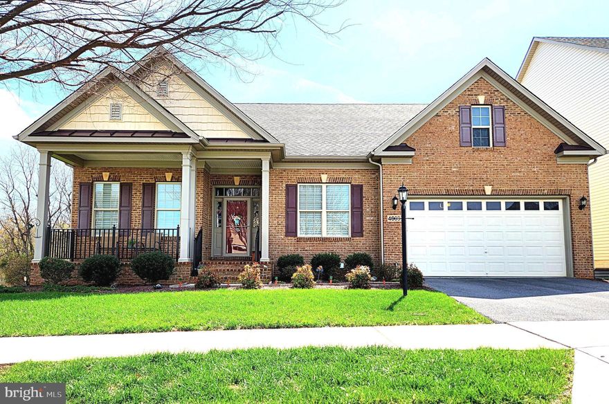 Open Houses this Saturday 05/30 11AM-2PM and Sunday 05/31 1-4PM - This stunning luxury ranch-style home located in the highly sought-after Landsdale community offers the very best in single-level living plus an expansive finished lower-level providing plenty of versatile space. Featuring 9-foot ceilings throughout, the home welcomes you with a gorgeous octagonal foyer, elegant crown moldings, and rich hardwood floors that set the tone for refined comfort.

The gourmet kitchen is a true centerpiece, boasting a gas cooktop, double wall ovens, granite countertops, rich cabinetry, and a large island ideal for entertaining. It opens seamlessly into a light-filled, spacious living area with a cozy gas fireplace and direct access to a large composite deck.

The primary suite is a private retreat complete with tray ceiling, a generous walk-in closet and a luxurious en-suite bath featuring a soaking tub, double vanities, and a walk-in shower.  A lovely formal dining room, two additional bedrooms, a full hall bath with tub, comfortable office/den, a mud room leading to an attached two car garage and a convenient laundry room round out the main floor.

A huge, finished walk-out lower level provides additional living space including a large recreation area, a fourth bedroom with walk-in closet, a full bath, a finished storage room, and a huge utility/storage area.

Outdoor living is just as impressive, with a spacious composite deck overlooking a beautifully landscaped lot, an attractive paver patio, and a welcoming covered front porch all perfect for relaxing or entertaining. 

The Landsdale community provides excellent schools, beautiful resort style community pool, meeting rooms, multiple playgrounds, ball courts, walking paths and scenic ponds. Convenient to I-270, I-70, and amenities offered in thriving Urbana and Historic Frederick. 

Elegant ranchers like this one do not come on market often so don't miss out! Virtual staging used in some photos.