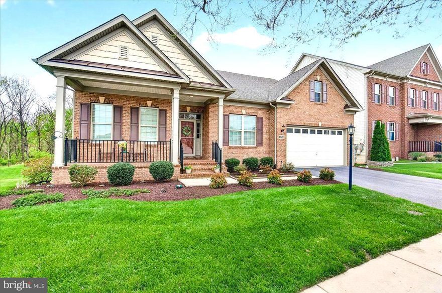 This stunning luxury ranch-style home located in the highly sought-after Landsdale community offers the very best in single-level living plus an expansive finished lower-level providing plenty of versatile space. Featuring 9-foot ceilings throughout, the home welcomes you with a gorgeous octagonal foyer, elegant crown moldings, and rich hardwood floors that set the tone for refined comfort.

The gourmet kitchen is a true centerpiece, boasting a gas cooktop, double wall ovens, granite countertops, rich cabinetry, and a large island ideal for entertaining. It opens seamlessly into a light-filled, spacious living area with a cozy gas fireplace and direct access to a large composite deck.

The primary suite is a private retreat complete with tray ceiling, a generous walk-in closet and a luxurious en-suite bath featuring a soaking tub, double vanities, and a walk-in shower.  A lovely formal dining room, two additional bedrooms, a full hall bath with tub, comfortable office/den, a mud room leading to an attached two car garage and a convenient laundry room round out the main floor.

A huge, finished walk-out lower level provides additional living space including a large recreation area, a fourth bedroom with walk-in closet, a full bath, a finished storage room, and a huge utility/storage area.

Outdoor living is just as impressive, with a spacious composite deck overlooking a beautifully landscaped lot, an attractive paver patio, and a welcoming covered front porch all perfect for relaxing or entertaining. 

The Landsdale community provides excellent schools, beautiful resort style community pool, meeting rooms, multiple playgrounds, ball courts, walking paths and scenic ponds. Convenient to I-270, I-70, and amenities offered in thriving Urbana and Historic Frederick. 

Elegant ranchers like this one do not come on market often so don't miss out! Virtual staging used in some photos.
