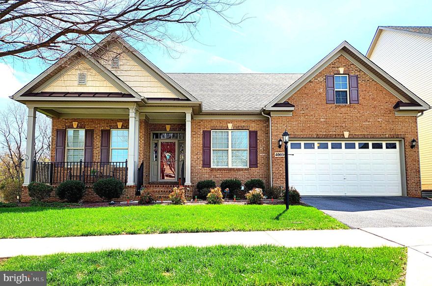 Open Houses this Saturday 05/30 11AM-2PM and Sunday 05/31 1-4PM - This stunning luxury ranch-style home located in the highly sought-after Landsdale community offers the very best in single-level living plus an expansive finished lower-level providing plenty of versatile space. Featuring 9-foot ceilings throughout, the home welcomes you with a gorgeous octagonal foyer, elegant crown moldings, and rich hardwood floors that set the tone for refined comfort.

The gourmet kitchen is a true centerpiece, boasting a gas cooktop, double wall ovens, granite countertops, rich cabinetry, and a large island ideal for entertaining. It opens seamlessly into a light-filled, spacious living area with a cozy gas fireplace and direct access to a large composite deck.

The primary suite is a private retreat complete with tray ceiling, a generous walk-in closet and a luxurious en-suite bath featuring a soaking tub, double vanities, and a walk-in shower.  A lovely formal dining room, two additional bedrooms, a full hall bath with tub, comfortable office/den, a mud room leading to an attached two car garage and a convenient laundry room round out the main floor.

A huge, finished walk-out lower level provides additional living space including a large recreation area, a fourth bedroom with walk-in closet, a full bath, a finished storage room, and a huge utility/storage area.

Outdoor living is just as impressive, with a spacious composite deck overlooking a beautifully landscaped lot, an attractive paver patio, and a welcoming covered front porch all perfect for relaxing or entertaining. 

The Landsdale community provides excellent schools, beautiful resort style community pool, meeting rooms, multiple playgrounds, ball courts, walking paths and scenic ponds. Convenient to I-270, I-70, and amenities offered in thriving Urbana and Historic Frederick. 

Elegant ranchers like this one do not come on market often so don't miss out! Virtual staging used in some photos.