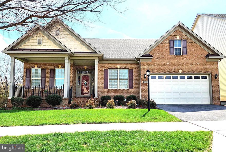 Open Houses this Saturday 05/30 11AM-2PM and Sunday 05/31 1-4PM - This stunning luxury ranch-style home located in the highly sought-after Landsdale community offers the very best in single-level living plus an expansive finished lower-level providing plenty of versatile space. Featuring 9-foot ceilings throughout, the home welcomes you with a gorgeous octagonal foyer, elegant crown moldings, and rich hardwood floors that set the tone for refined comfort.

The gourmet kitchen is a true centerpiece, boasting a gas cooktop, double wall ovens, granite countertops, rich cabinetry, and a large island ideal for entertaining. It opens seamlessly into a light-filled, spacious living area with a cozy gas fireplace and direct access to a large composite deck.

The primary suite is a private retreat complete with tray ceiling, a generous walk-in closet and a luxurious en-suite bath featuring a soaking tub, double vanities, and a walk-in shower.  A lovely formal dining room, two additional bedrooms, a full hall bath with tub, comfortable office/den, a mud room leading to an attached two car garage and a convenient laundry room round out the main floor.

A huge, finished walk-out lower level provides additional living space including a large recreation area, a fourth bedroom with walk-in closet, a full bath, a finished storage room, and a huge utility/storage area.

Outdoor living is just as impressive, with a spacious composite deck overlooking a beautifully landscaped lot, an attractive paver patio, and a welcoming covered front porch all perfect for relaxing or entertaining. 

The Landsdale community provides excellent schools, beautiful resort style community pool, meeting rooms, multiple playgrounds, ball courts, walking paths and scenic ponds. Convenient to I-270, I-70, and amenities offered in thriving Urbana and Historic Frederick. 

Elegant ranchers like this one do not come on market often so don't miss out! Virtual staging used in some photos.