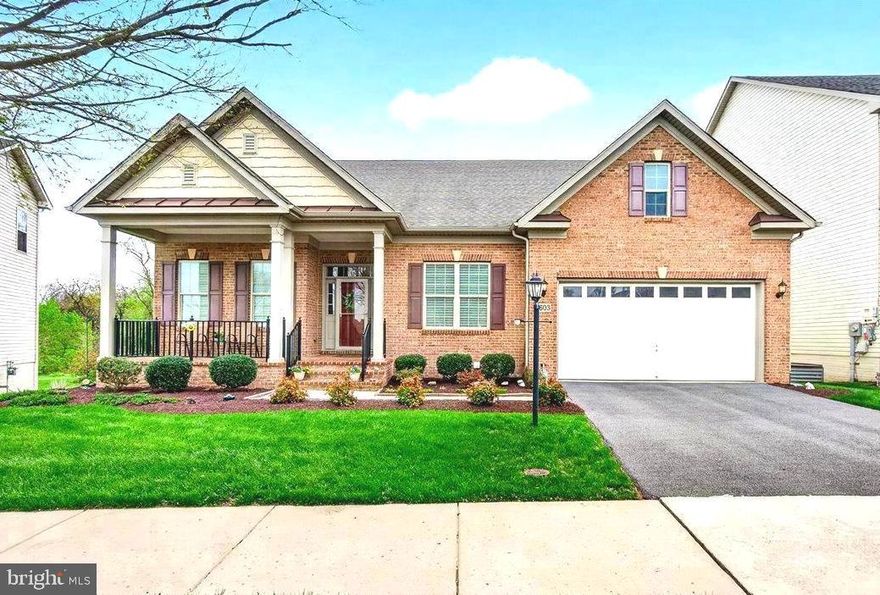 Open Houses this Saturday 05/30 11AM-2PM and Sunday 05/31 1-4PM - This stunning luxury ranch-style home located in the highly sought-after Landsdale community offers the very best in single-level living plus an expansive finished lower-level providing plenty of versatile space. Featuring 9-foot ceilings throughout, the home welcomes you with a gorgeous octagonal foyer, elegant crown moldings, and rich hardwood floors that set the tone for refined comfort.

The gourmet kitchen is a true centerpiece, boasting a gas cooktop, double wall ovens, granite countertops, rich cabinetry, and a large island ideal for entertaining. It opens seamlessly into a light-filled, spacious living area with a cozy gas fireplace and direct access to a large composite deck.

The primary suite is a private retreat complete with tray ceiling, a generous walk-in closet and a luxurious en-suite bath featuring a soaking tub, double vanities, and a walk-in shower.  A lovely formal dining room, two additional bedrooms, a full hall bath with tub, comfortable office/den, a mud room leading to an attached two car garage and a convenient laundry room round out the main floor.

A huge, finished walk-out lower level provides additional living space including a large recreation area, a fourth bedroom with walk-in closet, a full bath, a finished storage room, and a huge utility/storage area.

Outdoor living is just as impressive, with a spacious composite deck overlooking a beautifully landscaped lot, an attractive paver patio, and a welcoming covered front porch all perfect for relaxing or entertaining. 

The Landsdale community provides excellent schools, beautiful resort style community pool, meeting rooms, multiple playgrounds, ball courts, walking paths and scenic ponds. Convenient to I-270, I-70, and amenities offered in thriving Urbana and Historic Frederick. 

Elegant ranchers like this one do not come on market often so don't miss out! Virtual staging used in some photos.
