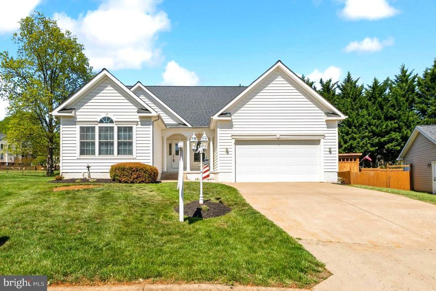 Beautiful two level rambler featuring 3 spacious bedrooms and 2 full baths all on the Main Level! Nestled on a premium Cul-De-Sac lot in the heart of Warrenton with Low HOA fees and exceptional curb appeal. Step onto the welcoming covered front porch and into a bright, open foyer. Inside, you’ll find fresh paint throughout, gleaming hardwood floors in the foyer and living areas, and ceramic tile in the sun-filled eat-in kitchen and formal dining room. The eat-in kitchen is a chef’s delight, complete with granite counters, center island, stainless steel appliances (2020),  and plenty of cabinet space!. Adjacent to the kitchen are both the formal dining room and a generously sized family room featuring a cathedral ceiling, gas fireplace, and direct access to the sunroom, laundry/mudroom, and primary suite. The sunroom is a serene retreat with access to the composite deck, ideal for relaxing or entertaining. The primary bedroom suite offers a large walk-in closet and an ensuite bath with a dual vanity, soaking tub, and separate walk-in shower! Two additional bedrooms and another full bathroom complete the main level. Conveniently located off the laundry/mudroom is the 2-car garage, complete with a utility sink and space for a full-size washer and dryer. The expansive unfinished basement features walk-out and up access—providing endless possibilities for additional living space, storage, or recreation. Additional features include a central vacuum system, new water heater (2023), HVAC (2020), and roof (2018) for added peace of mind.