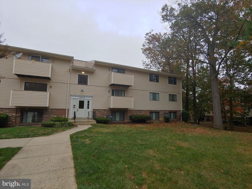 Back on the market...Buyer backed out & your chance for this again!  New Year...New Price!  Spacious, Bright & Open 2 BR condo with water/sewer included in low condo fee!  Secured Building & Assigned Parking Spot.  Separate Laundry Room with Full-Size Washer & Dryer.  Updated ceramic bath.  Plenty of closet space throughout for storage.  Newer windows & freshly painted.  New light fixtures & ready to move in or rent out!  Great commuter location.  Convenient to highways, shopping, restaurants and public transportation.  Motivated Seller - Value at it's best!