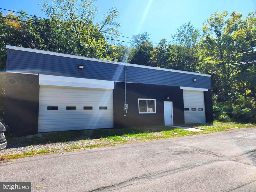 New Improved Rental Price!!! For Lease: Spacious 2-Bay Commercial Garage – Ideal for Business & Storage!  Looking for a functional and flexible space for your business? This 2-bay garage features high ceilings, large overhead doors, and ample room for various business operations. Whether you’re in automotive services, trades, storage, or small-scale manufacturing, this space is ready for you! Key Features: Two large bays with overhead doors, for easy access, High ceilings for large equipment & storage needs, Secure location with ample parking, Electrical hookups for tools & machinery, Great accessibility for deliveries, clients & employees, Bathroom and office space (if applicable). Perfect for Automotive Repair and services-Mechanic shop, detailing, bodywork, tire shop, custom builds, trades and contractors, storage and warehousing,  fleet and vehicle storage, manufacturing and fabrication, creative and industrial, agricultural and landscaping, this space could be for you!  Conveniently located with quick access to I-68 East and West! 
At just $2,000 per month (negotiable per space needed) plus utilities, this is an affordable chance to step into business ownership without the heavy overhead of purchasing a property.  Long or short term lease available!!!  Call today to schedule a showing!