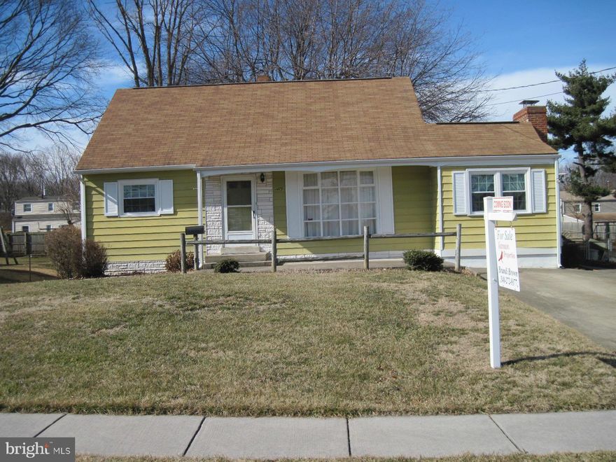 CHARMING CAPE COD SHOWS OWNER PRIDE!  Big ticket items already done...just needs some cosmetic updates to make it your own!  Recent improvements include heat pump, hot water baseboard heat, roof, windows, wood floors just refinished in bedrooms, deck.  Original wood flooring under carpet in LR.  Basement has potential for separate apartment or in-law suite. Great location!