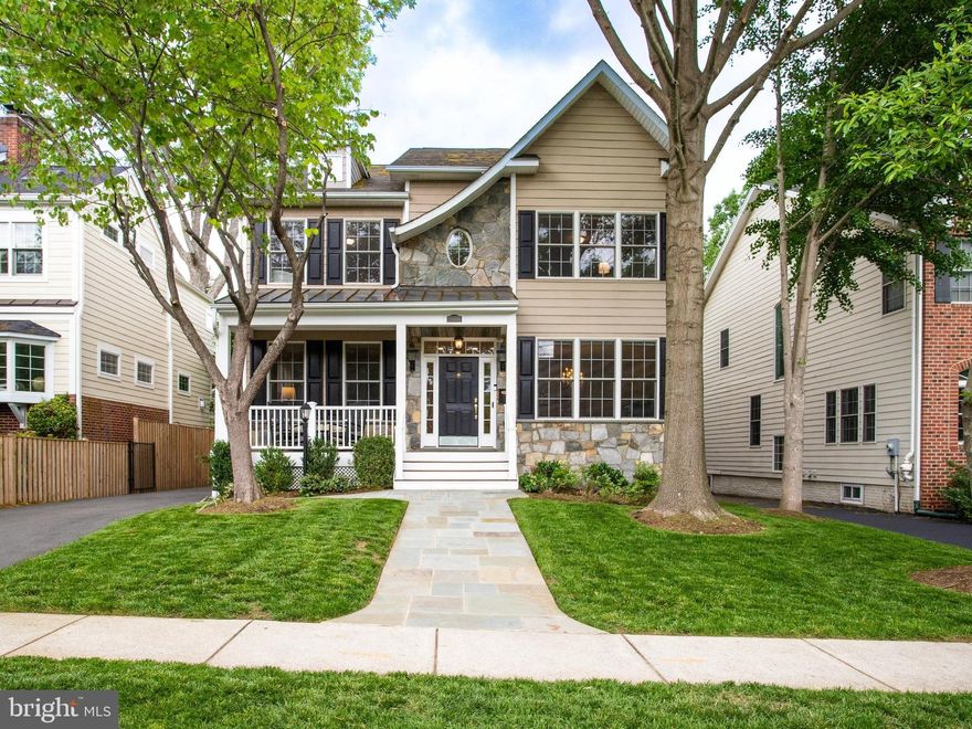 Brilliantly updated and perfectly positioned in the heart of Arlington’s beloved Westover, this 5BR/4.5BA, 4,790 sqft craftsman-style home offers the warmth, character, and modern comfort every homeowner dreams of. It welcomes you with timeless curb appeal, mature landscaping, a charming covered front porch, gas lanterns and a brand-new asphalt driveway (2024) set the tone for what’s to come.

Step inside and instantly feel at home. From the rich hardwood floors and soaring 9’ ceilings to the custom molding and elegant flow of living spaces, every detail invites both comfort and connection. Gather with loved ones in the sun-drenched family room around the fireplace, host memorable holidays in the formal dining room, or simply unwind in the peaceful front living room. The main level also includes a convenient laundry room and mudroom adding everyday ease and a perfect drop zone for bags, coats, and muddy boots.

At the heart of the home is a show-stopping, open-concept gourmet kitchen with white cabinetry, sleek quartz countertops, and stainless steel appliances. Whether it’s pancake breakfasts or wine-filled evenings with friends, this is a space made for living and laughter. Step out back to a private, fully fenced yard where joy unfolds. Grill out on the brand-new Trex deck (2024), watch kids play on the playset, or enjoy the convenience of a detached two-car garage.

Upstairs, retreat to your dreamy primary suite with tray ceilings, two walk-in closets, and a spa-like en suite that feels like a personal sanctuary. Two additional bedrooms share a stunning new Jack-and-Jill bathroom—part of a $120K structural renovation completed in 2024 while a fourth bedroom enjoys private access to its own full bath.

Downstairs, the finished lower level offers space to truly spread out. Think movie nights in the recreation room, quiet work-from-home days in the office, or cozy stays for guests in the private bedroom and bath. You’ll also find practical perks: two Carrier HVAC systems (2016), a newer water heater with UV filtration (2021), and fresh landscaping and flagstone (2023).

And then there's the location. Just blocks to the Metro and I-66, with easy access to both Reagan and Dulles Airports. Close to DC, yet tucked into a tight-knit, tree-lined community. Blocks to the Westover shops, enjoy coffee or a pint with neighbors, take part in the beloved Sunday Farmers Market, or join in the fun of neighborhood happy hours, Halloween block parties, and community yard sales. You're only moments from all the charm and dining of Falls Church City. Plus, Tuckahoe, Swanson, Yorktown!

This is more than a house. It’s a place where memories are made, traditions are born, and life is truly lived. Welcome home.